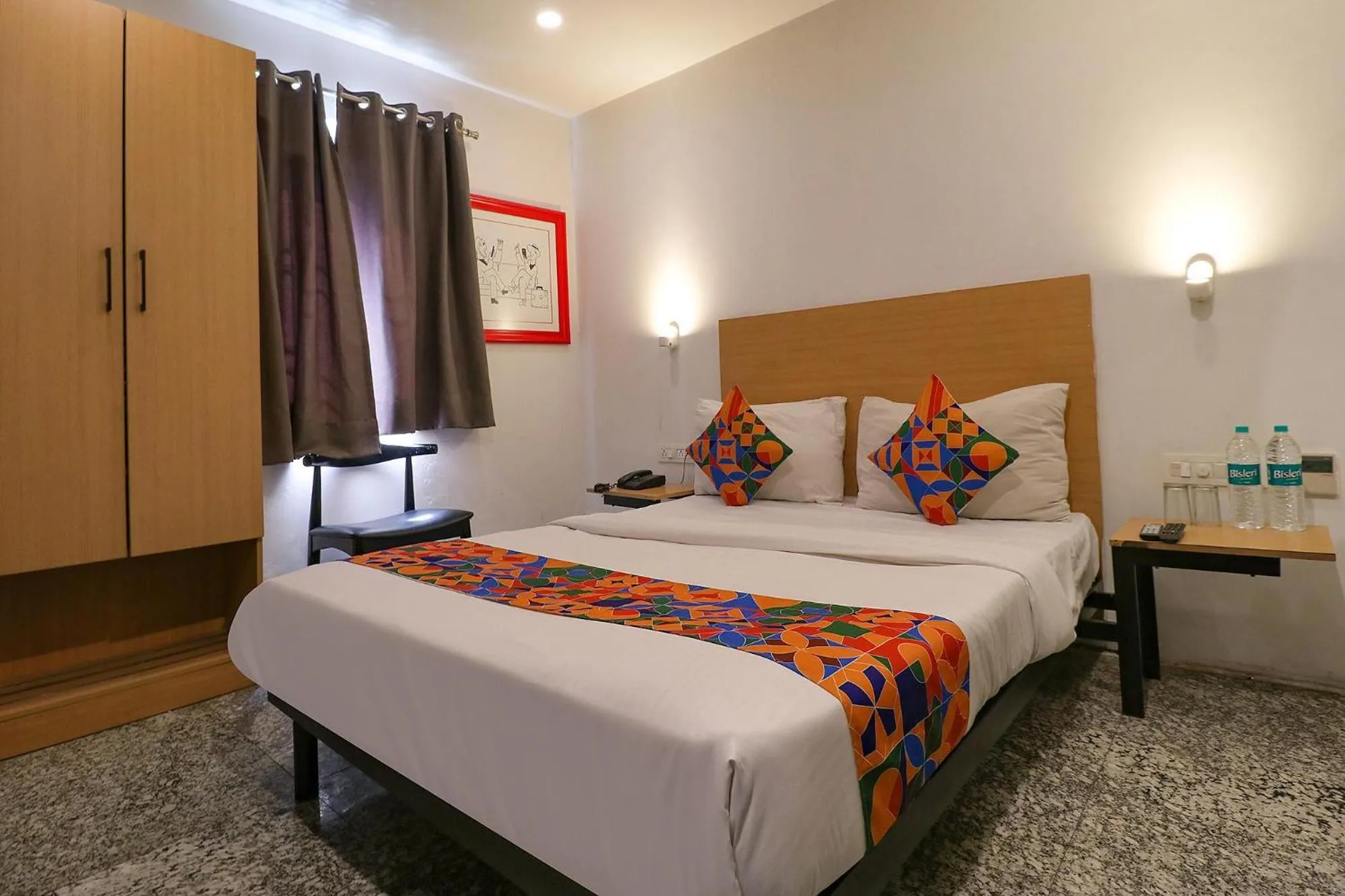 Bed in FabHotel La Serene Punjabi Bagh