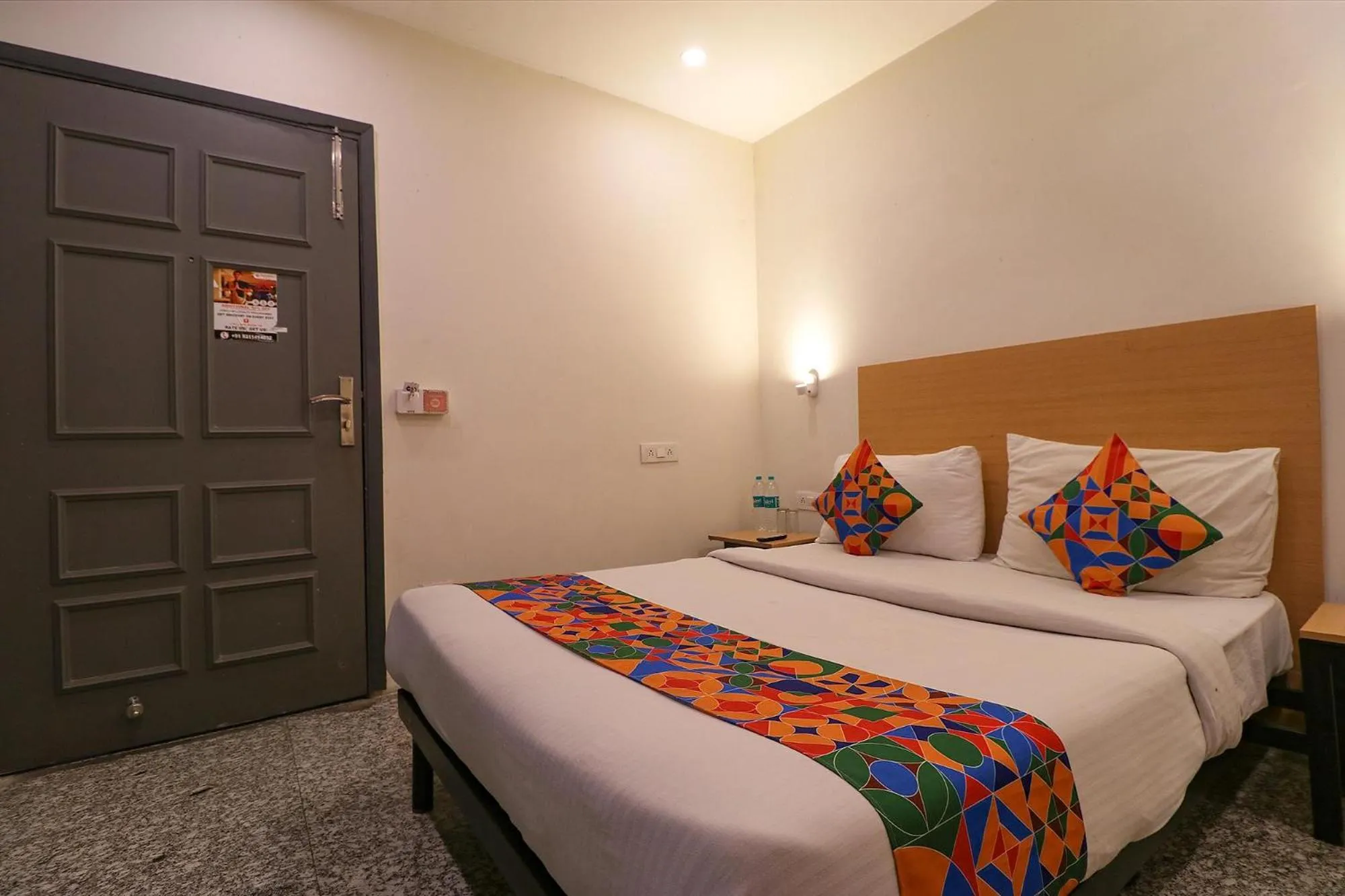 Bed in FabHotel La Serene Punjabi Bagh