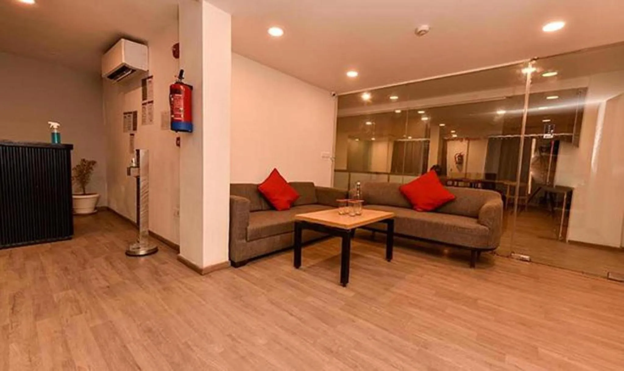 Seating area in FabHotel La Serene Punjabi Bagh