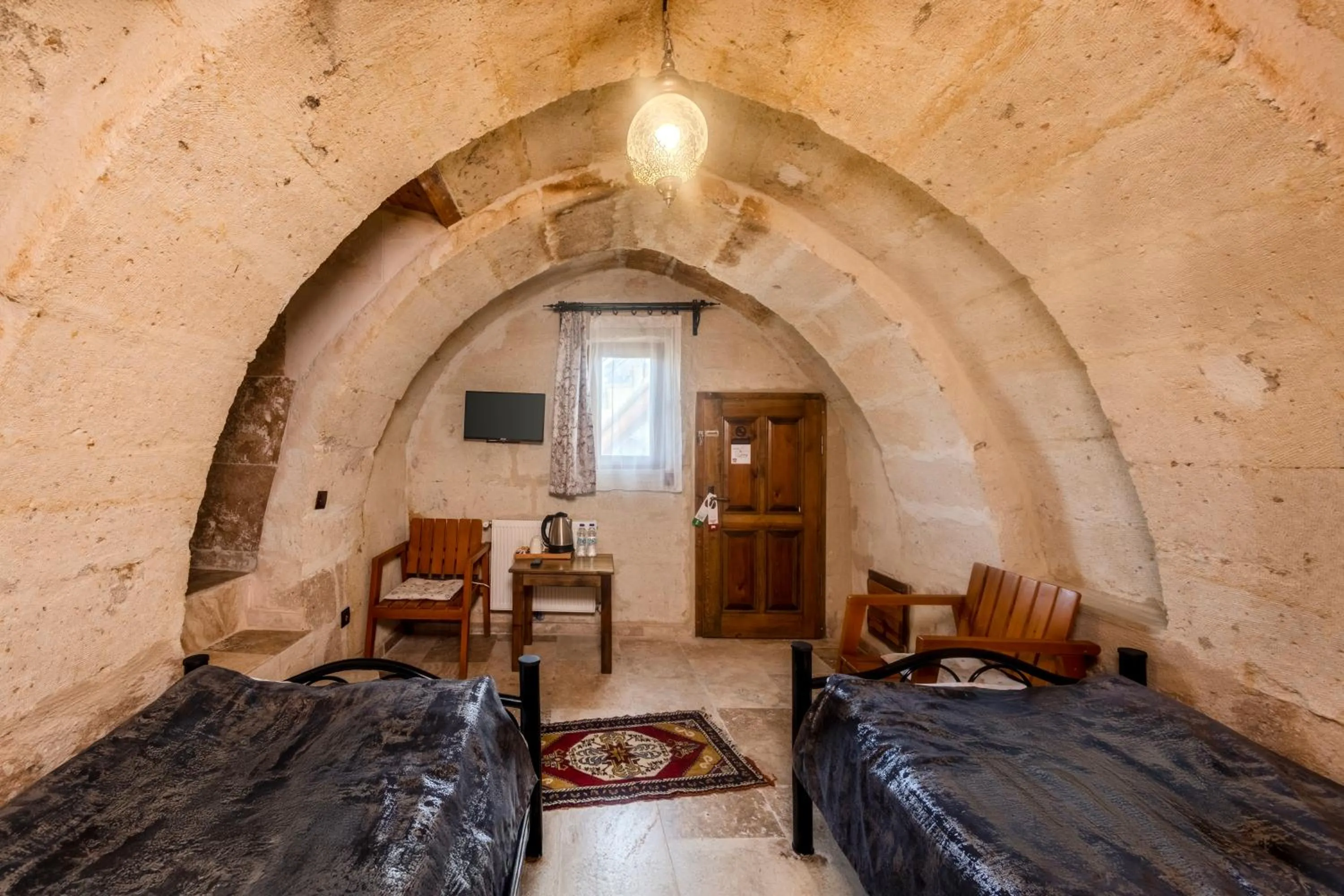 Bed in Zula Cave House