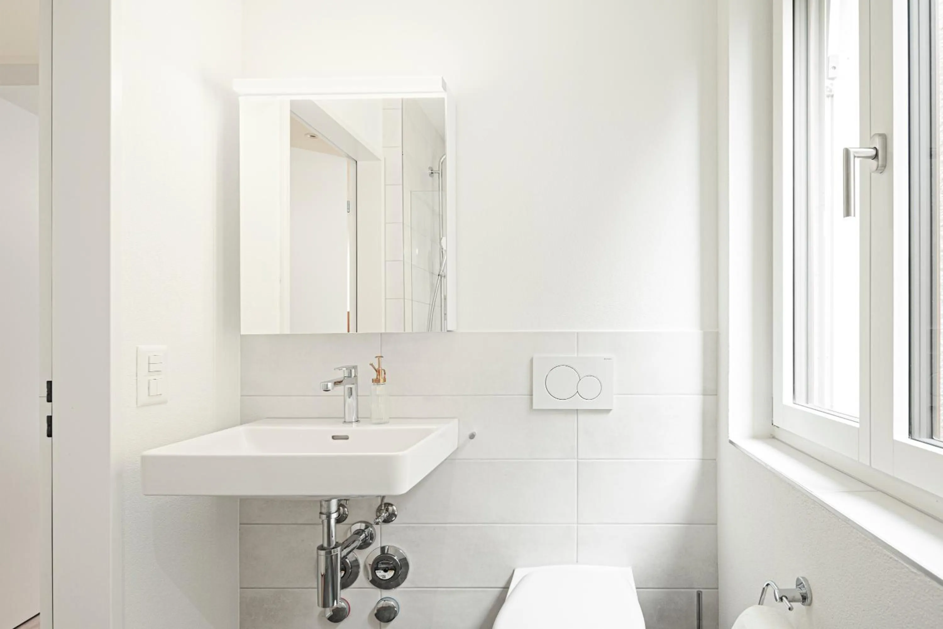 Toilet in VISIMO Apartments Mühlensteg St Gallen - Elegant Quiet Central