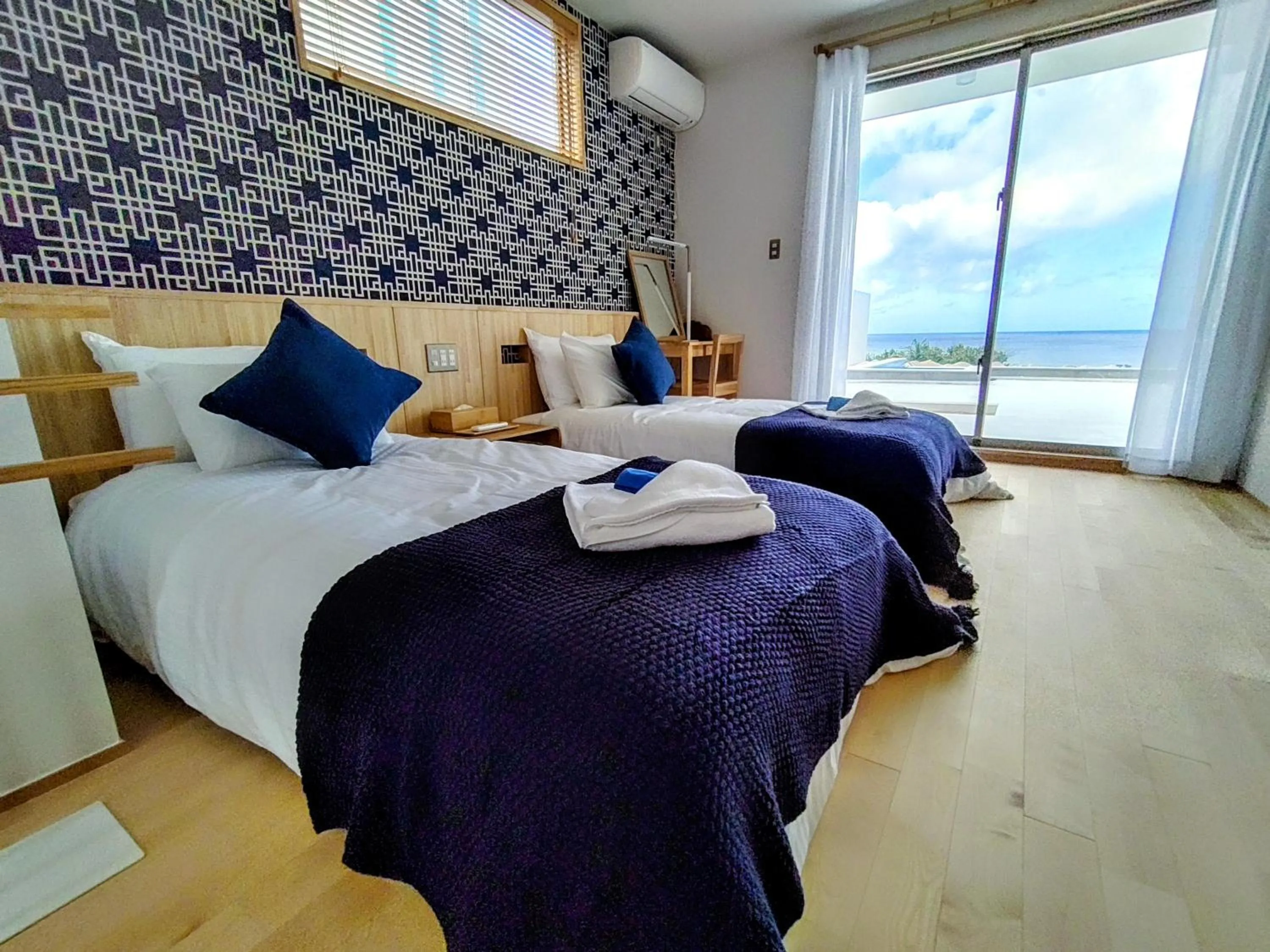 Bed in Ocean View Ishigaki Sora and Umi