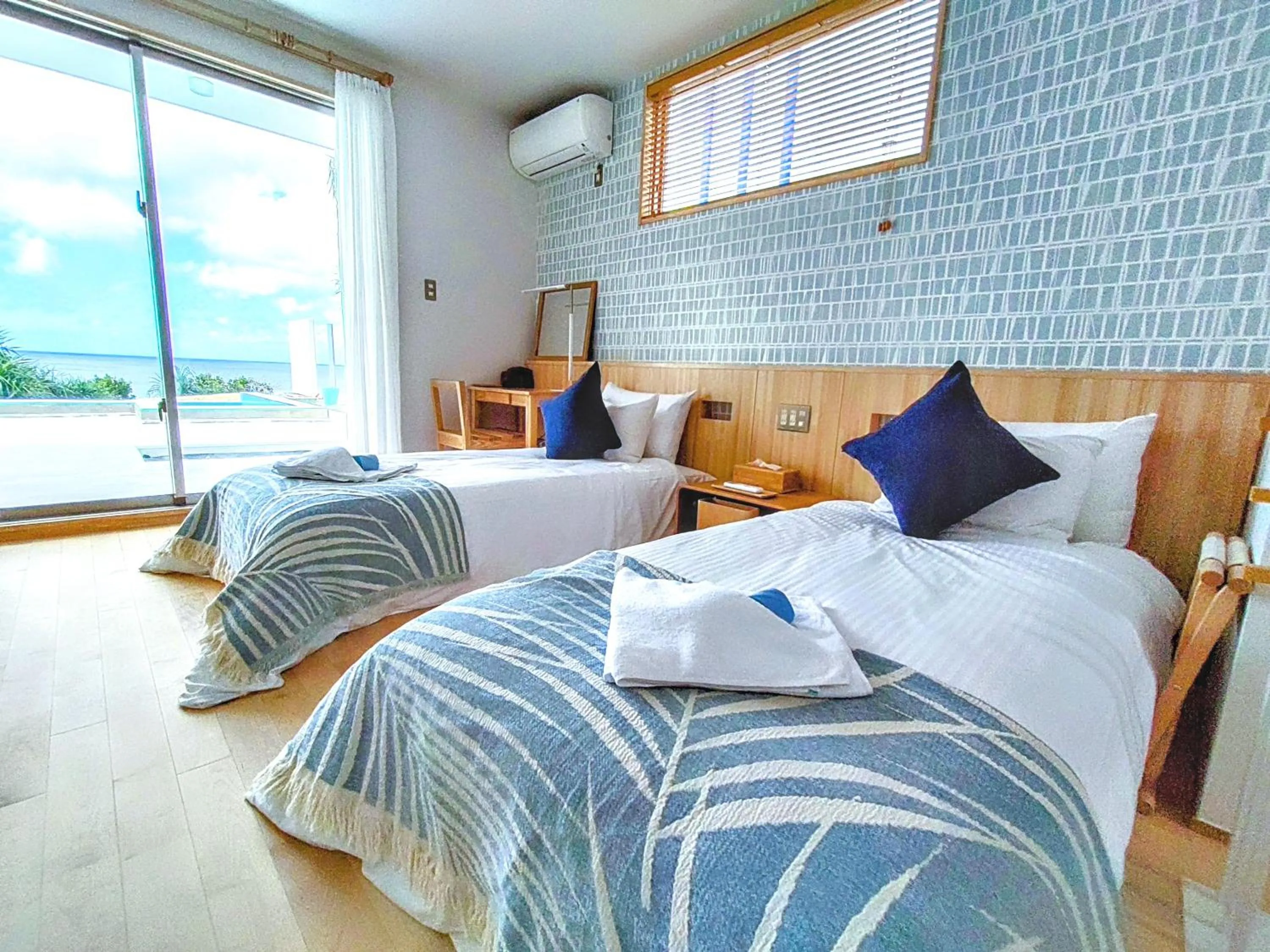 Bed in Ocean View Ishigaki Sora and Umi
