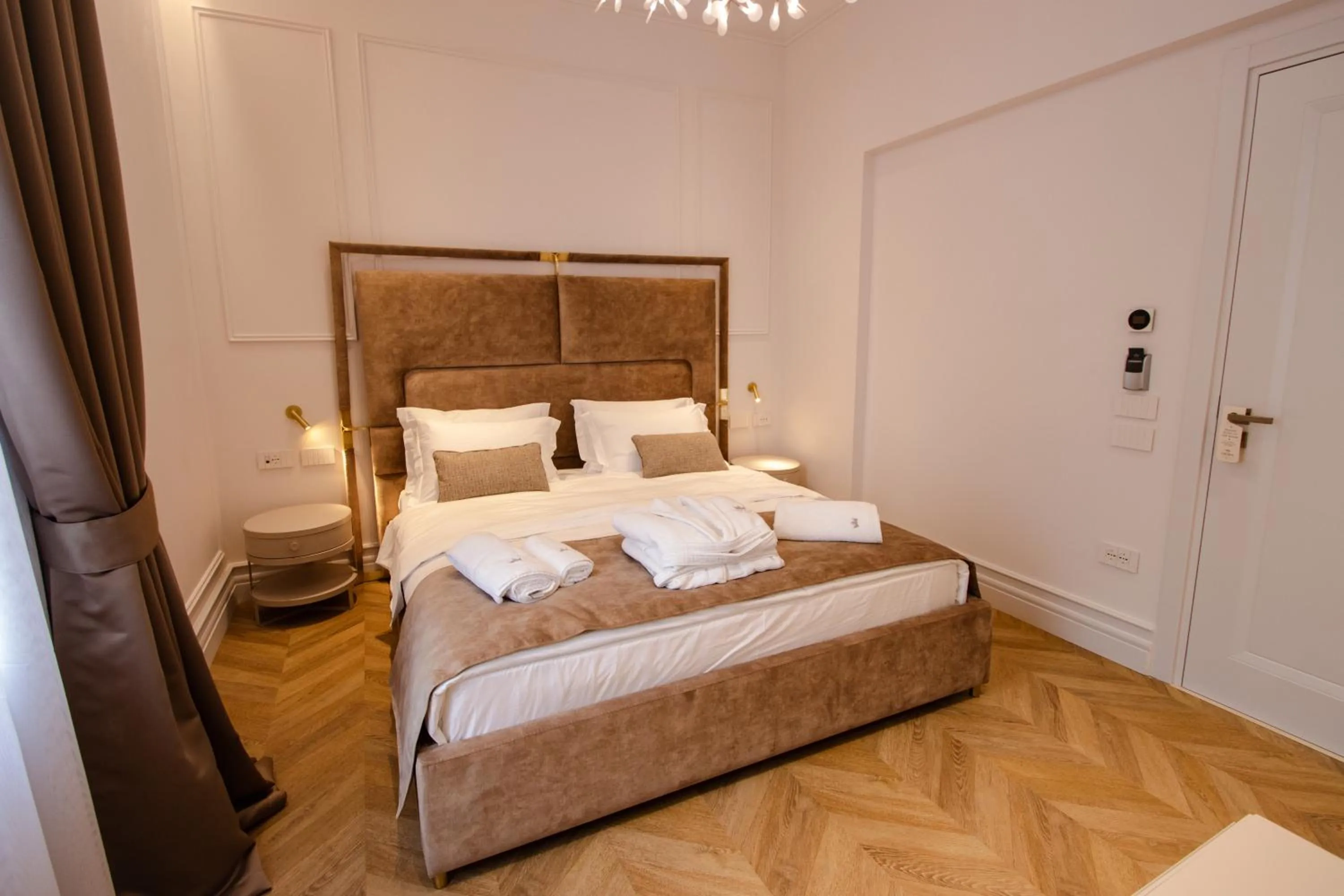 Bed in The Crown Boutique Hotel & SPA