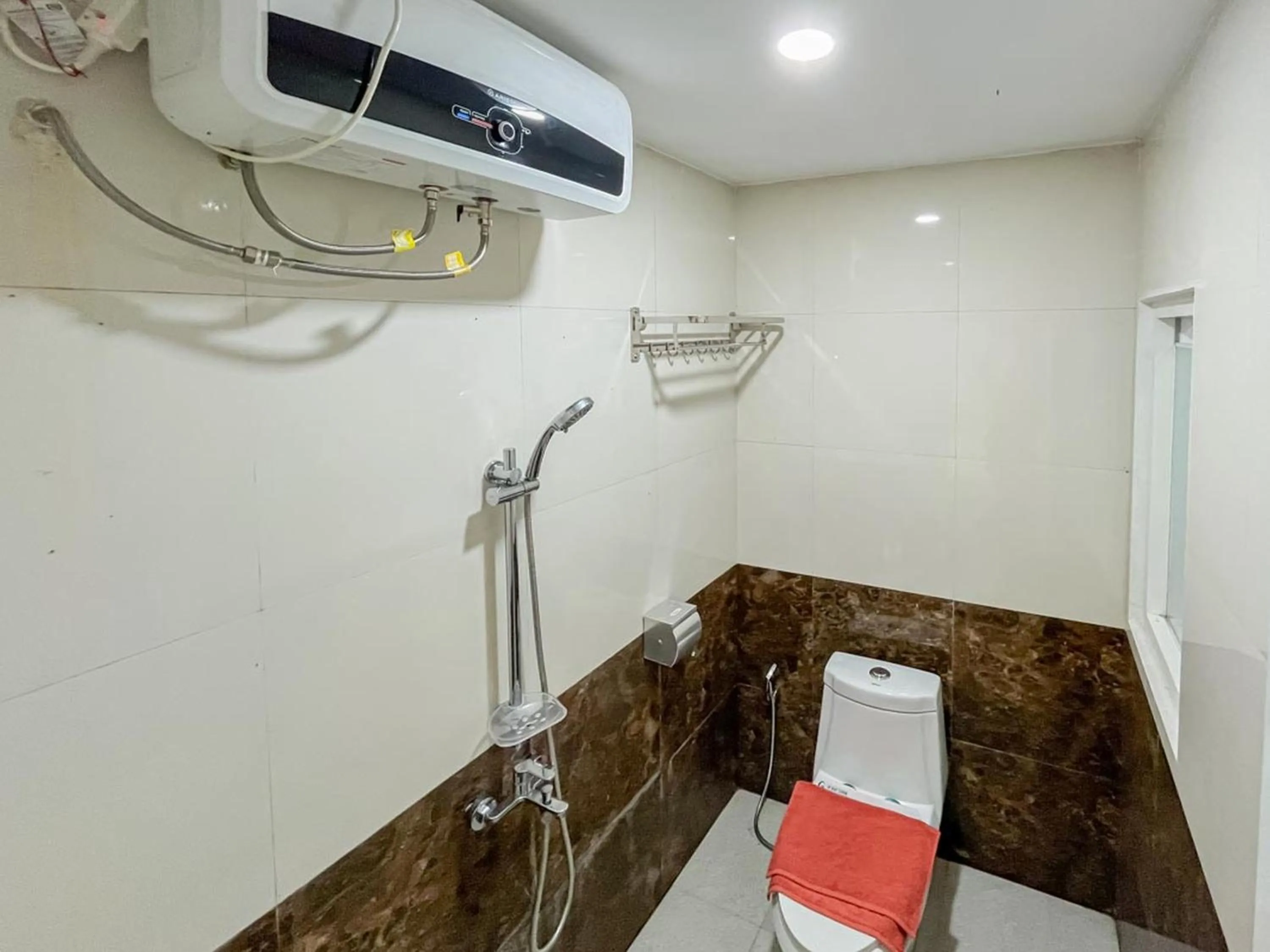 Bathroom in Sakura Guest House by The Lavana