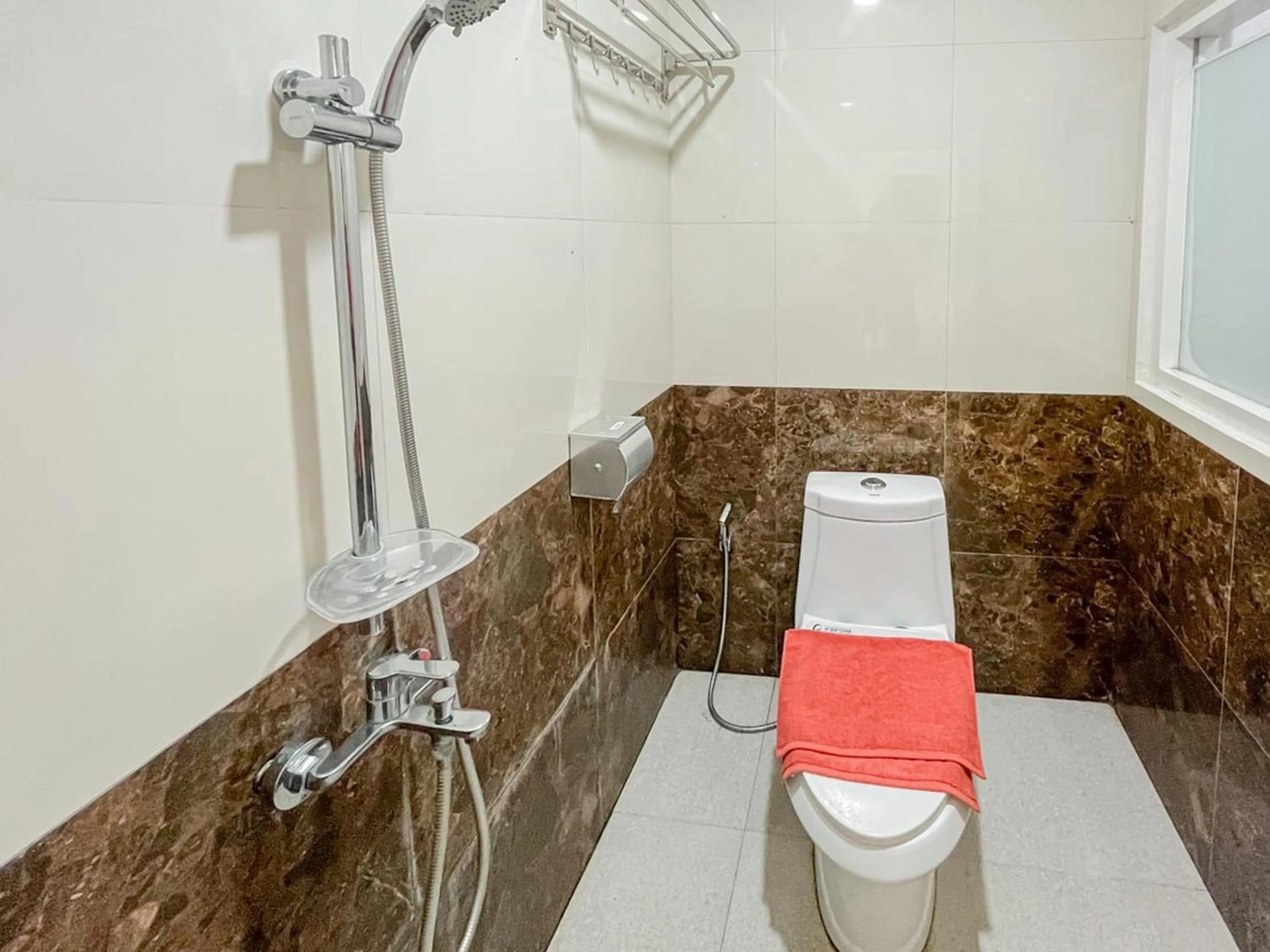 Bathroom in Sakura Guest House by The Lavana