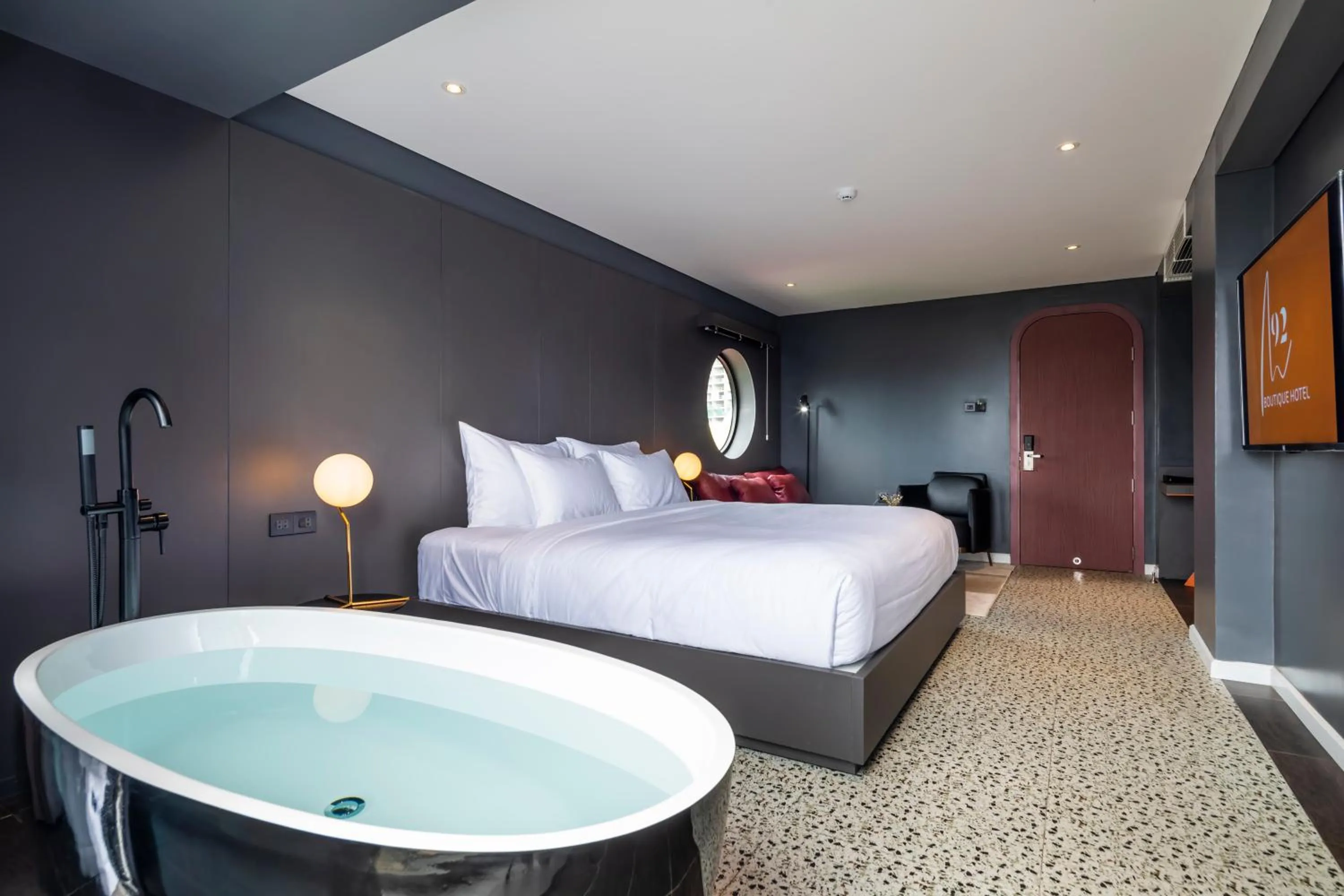 Photo of the whole room, Bed in M92 Boutique Da Nang Beach Hotel