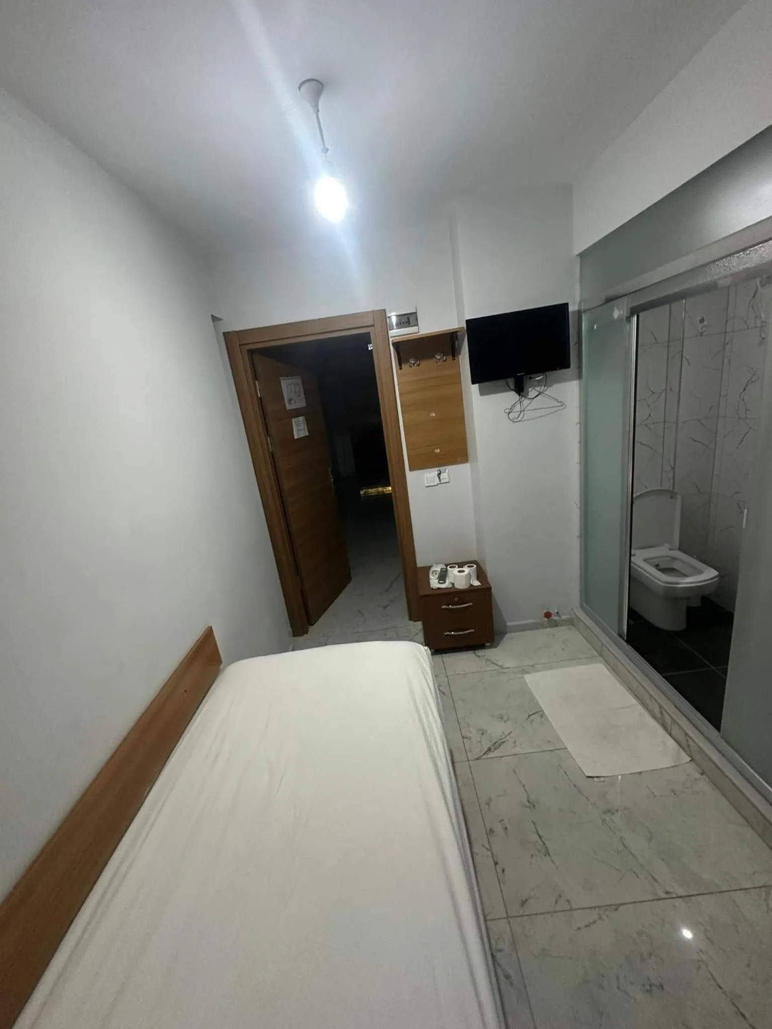 Photo of the whole room, Bed in NR1 HOTEL