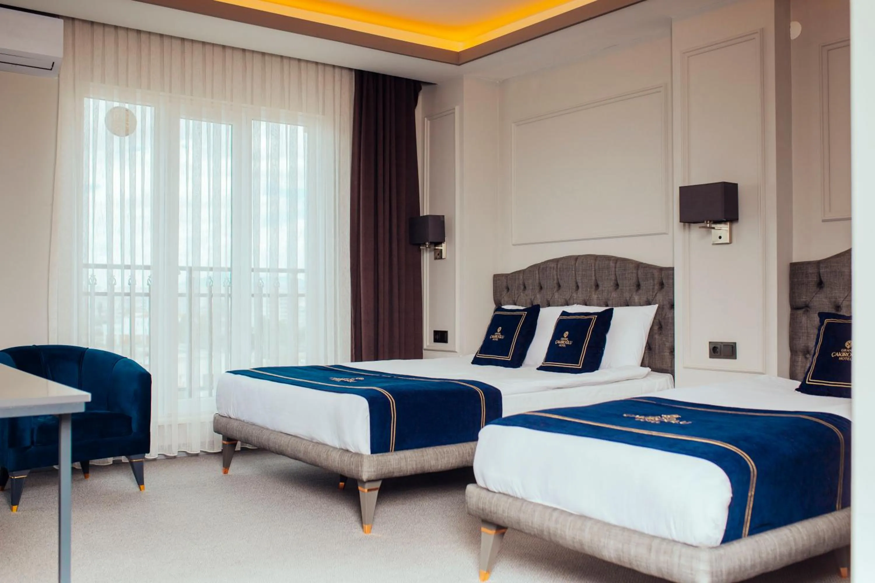 Bed in GRAND ÇAKIROĞLU HOTEL