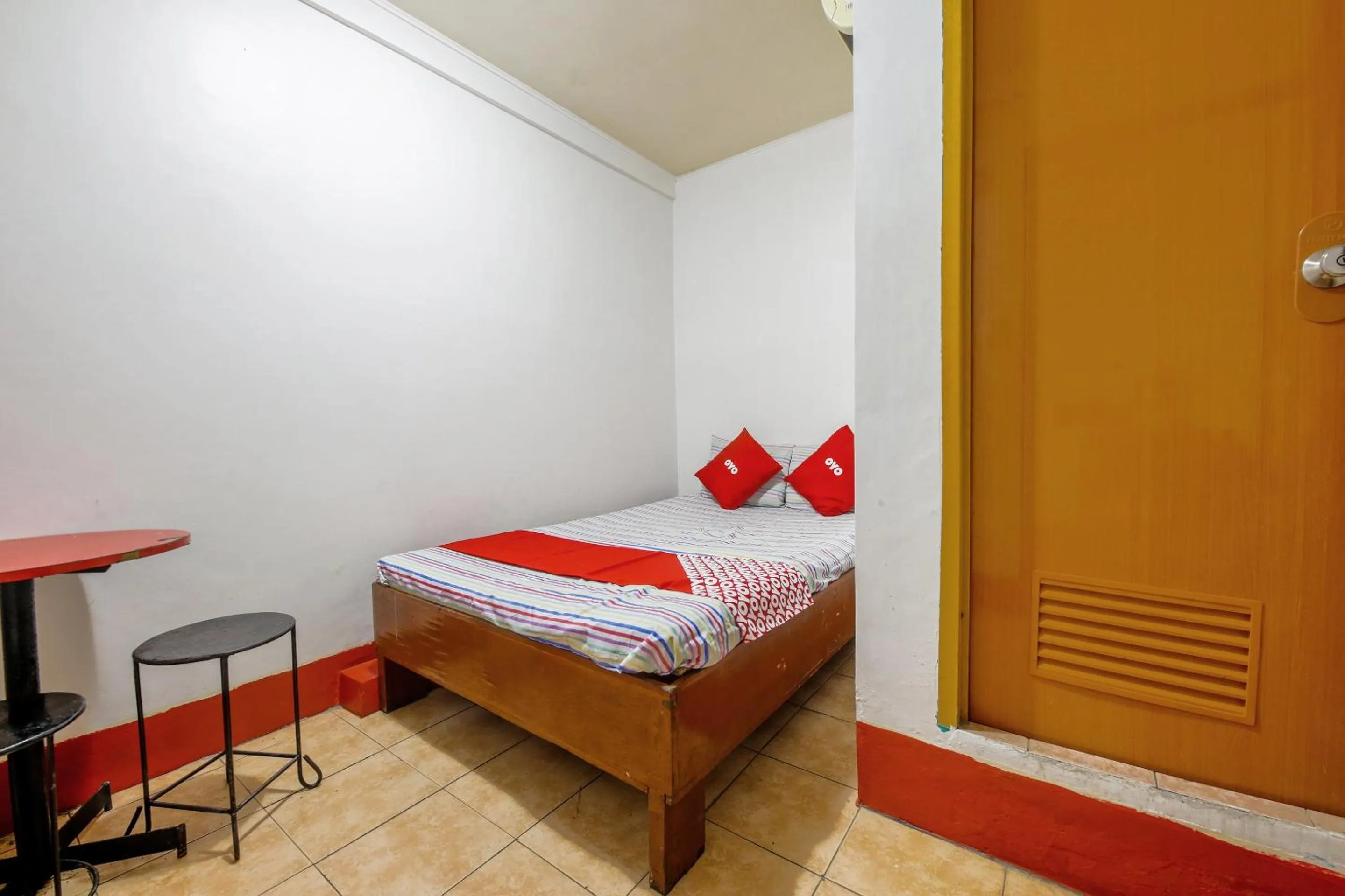 Bedroom in Busline Apartelle