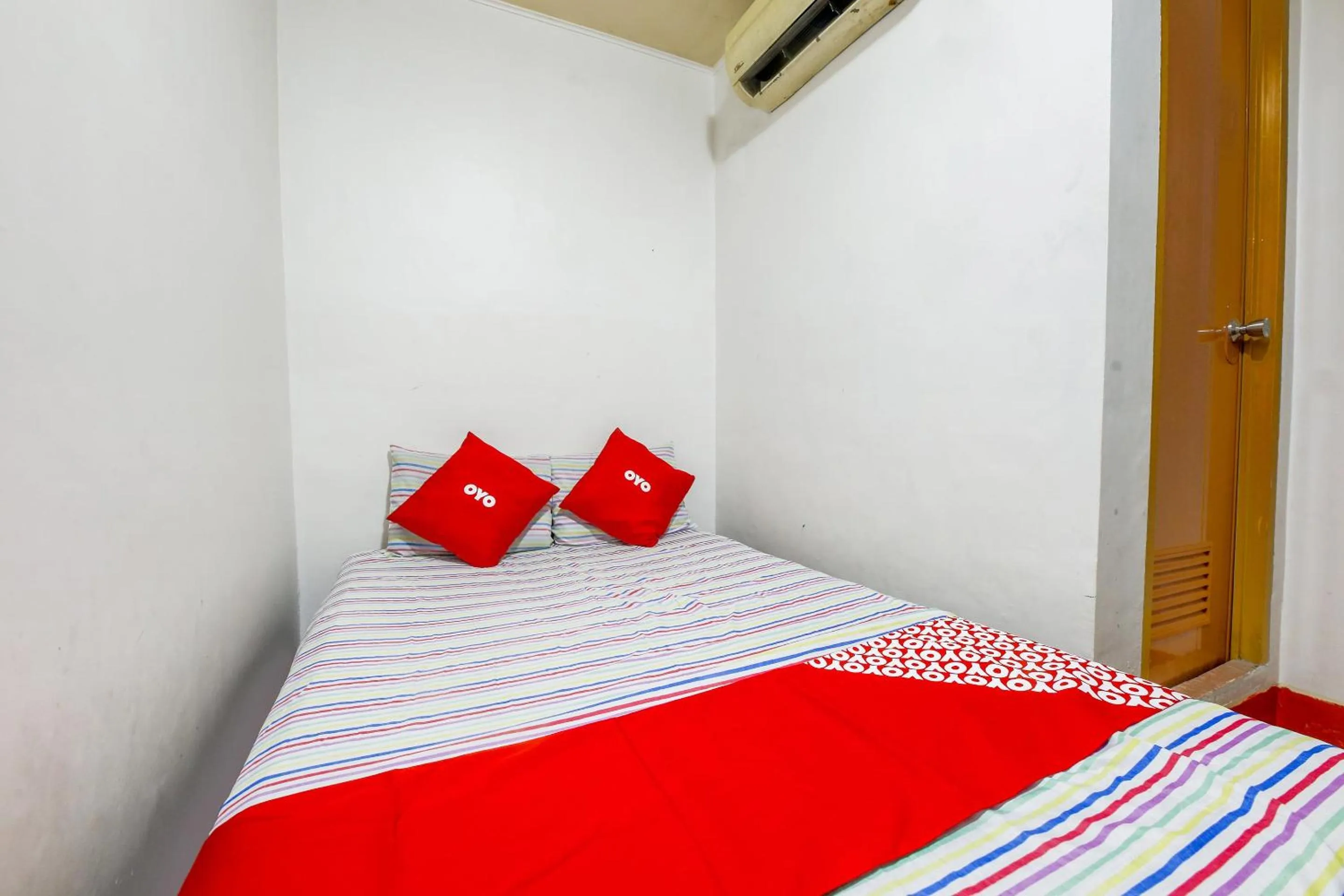 Bedroom in Busline Apartelle