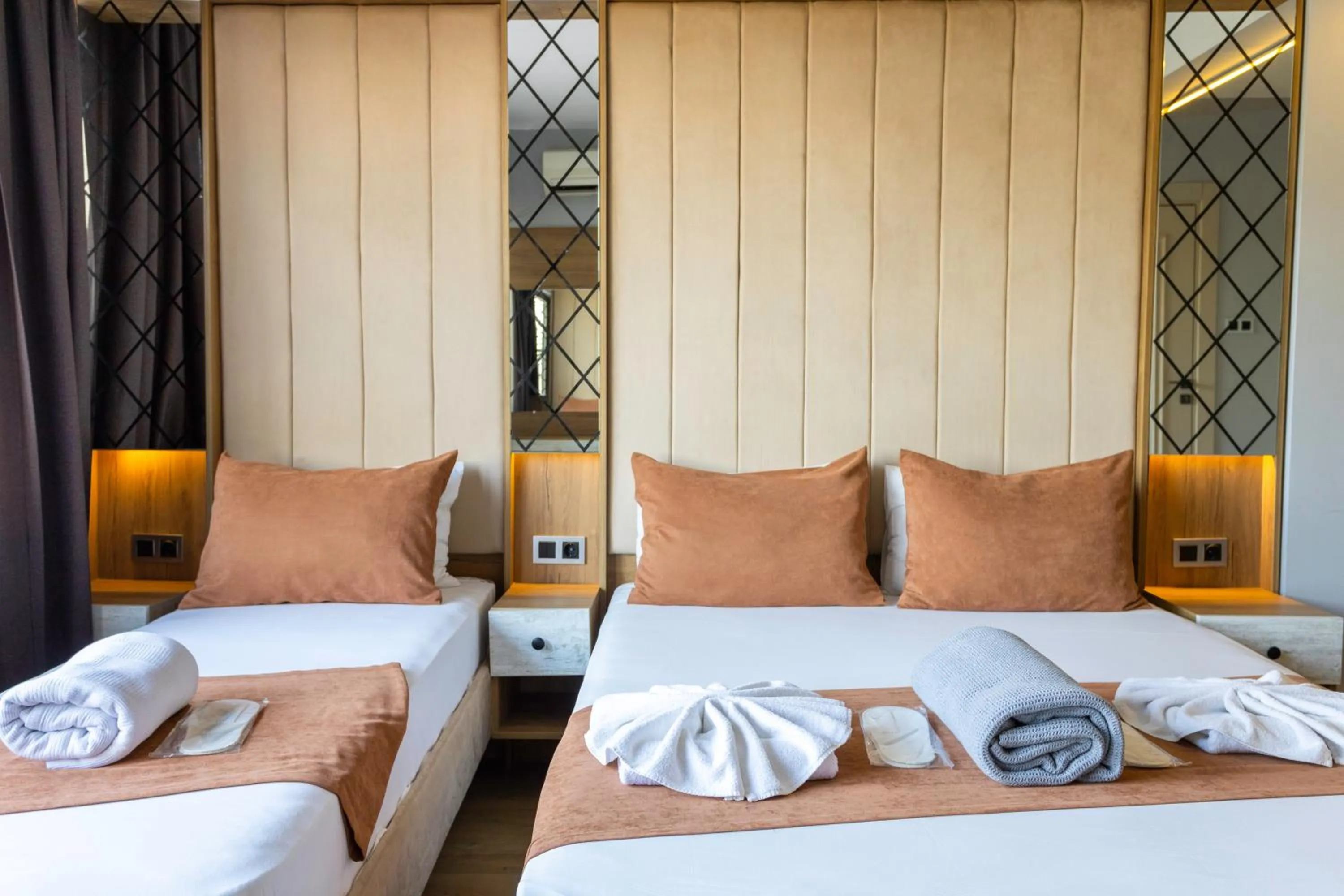 Bed in Lumina Boutique Hotel