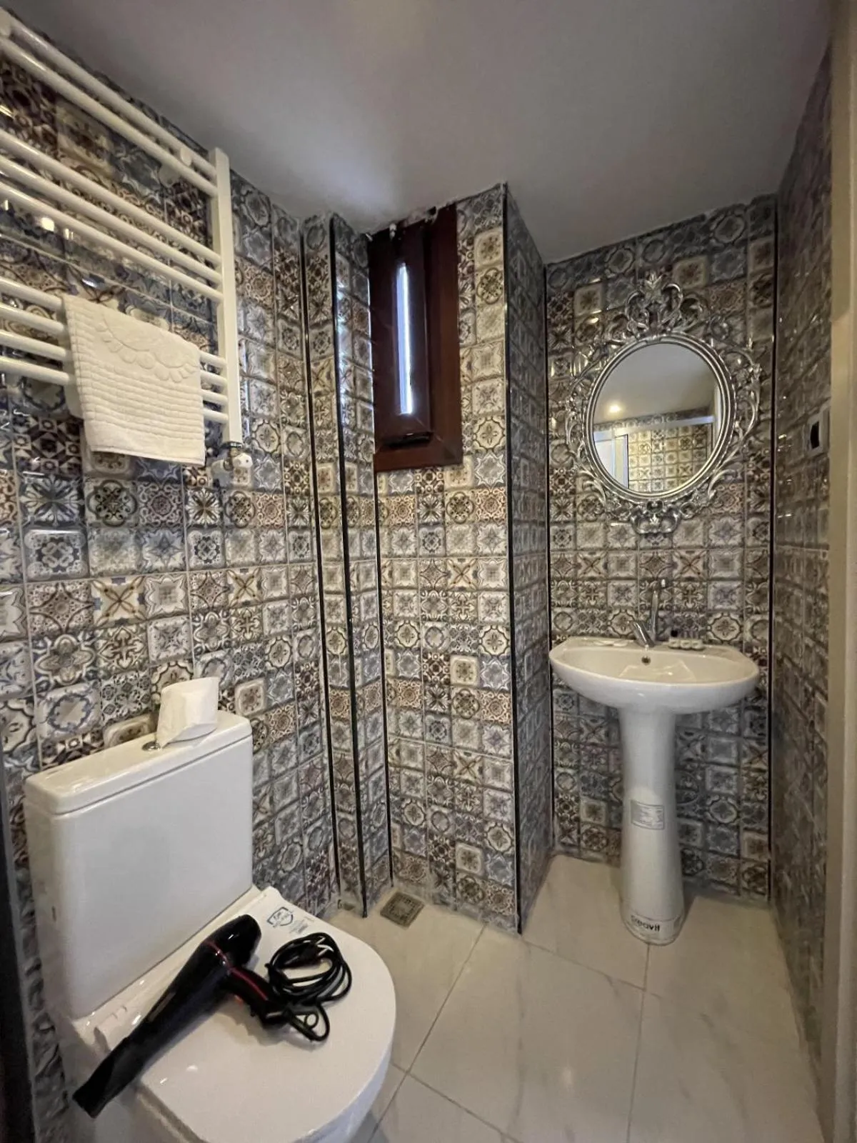 Toilet in Lumina Boutique Hotel