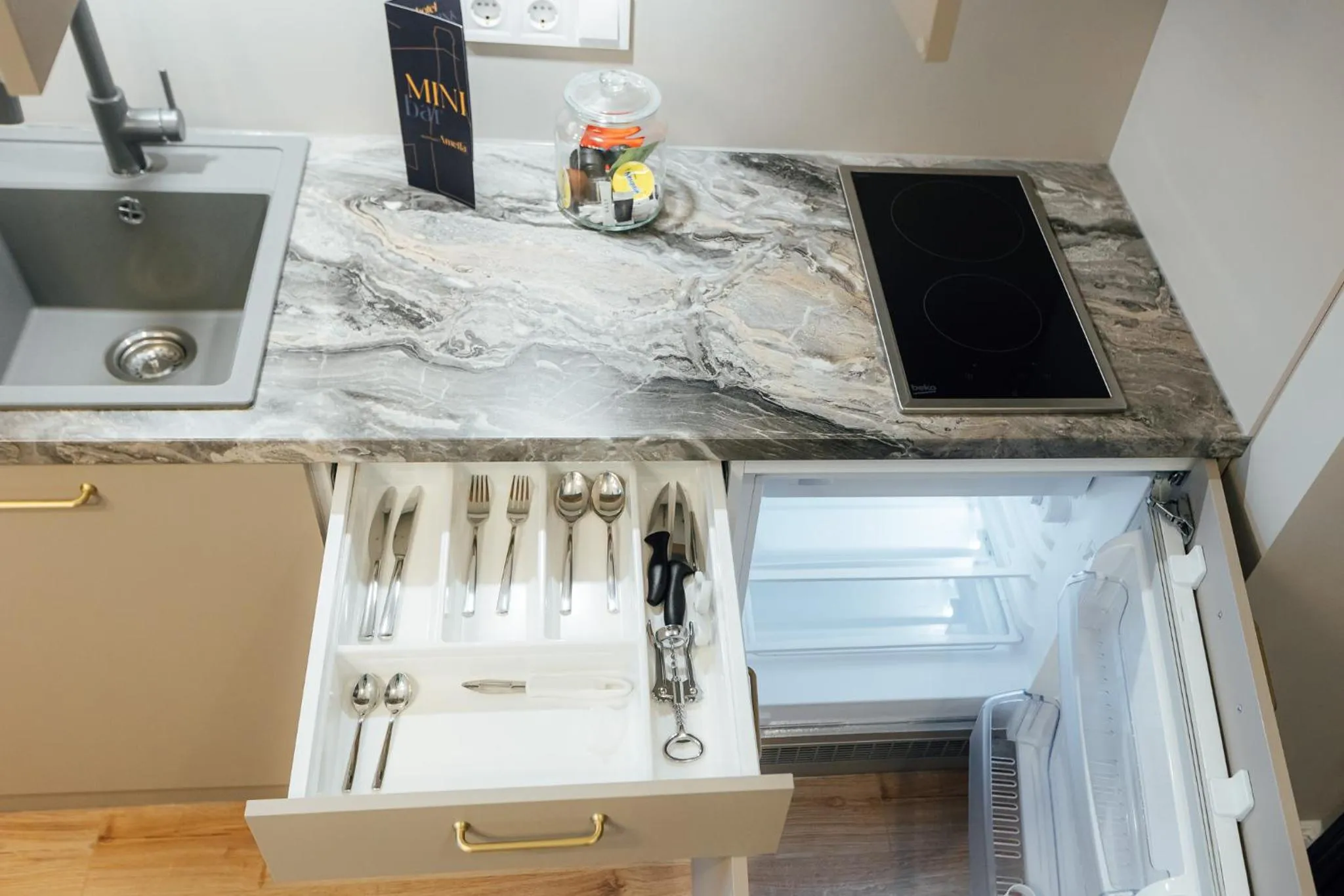 Kitchen or kitchenette in Aparthotel Amella