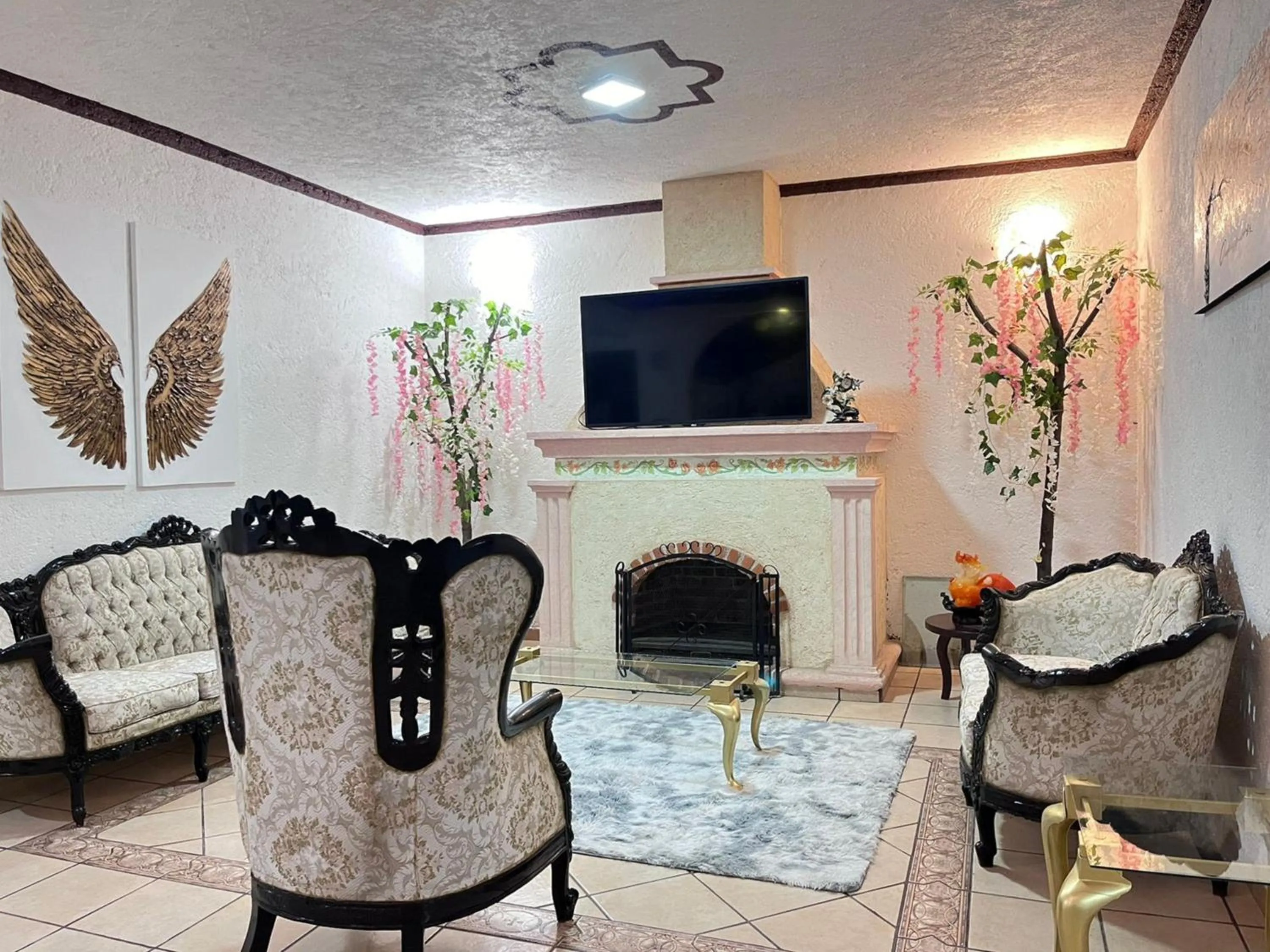 Communal lounge/ TV room in Hotel Peña Florencia