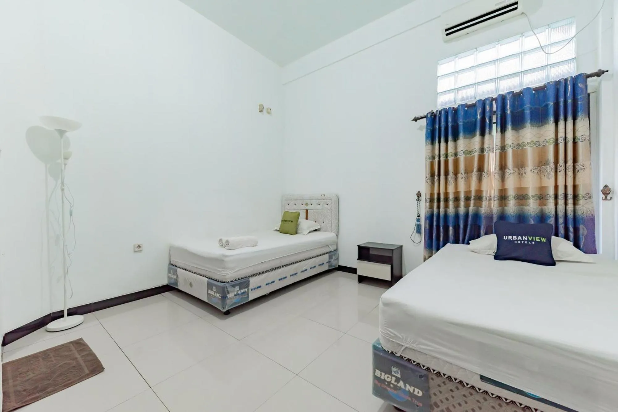 Bed in Urbanview Hotel Syariah 99 Banjarbaru by RedDoorz