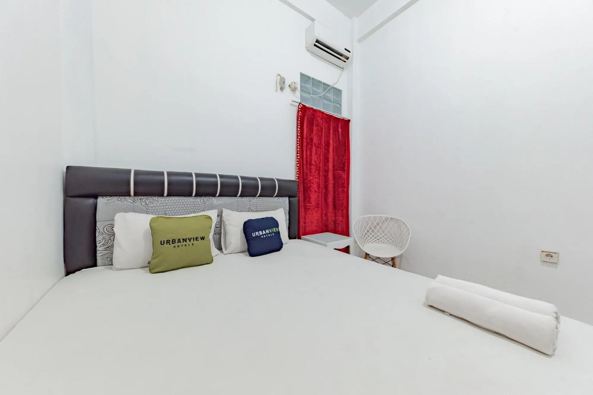 Bed in Urbanview Hotel Syariah 99 Banjarbaru by RedDoorz