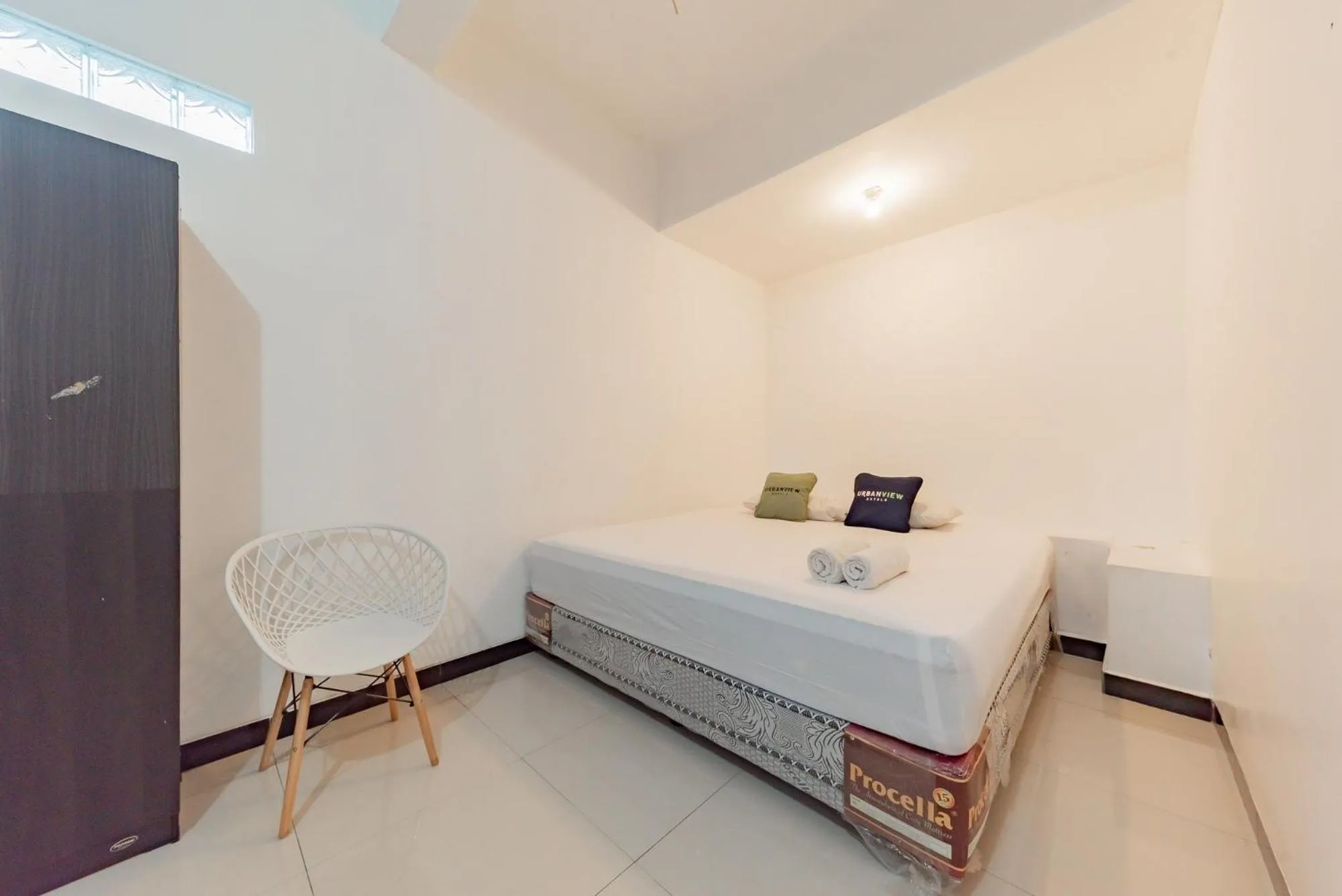 Bed in Urbanview Hotel Syariah 99 Banjarbaru by RedDoorz