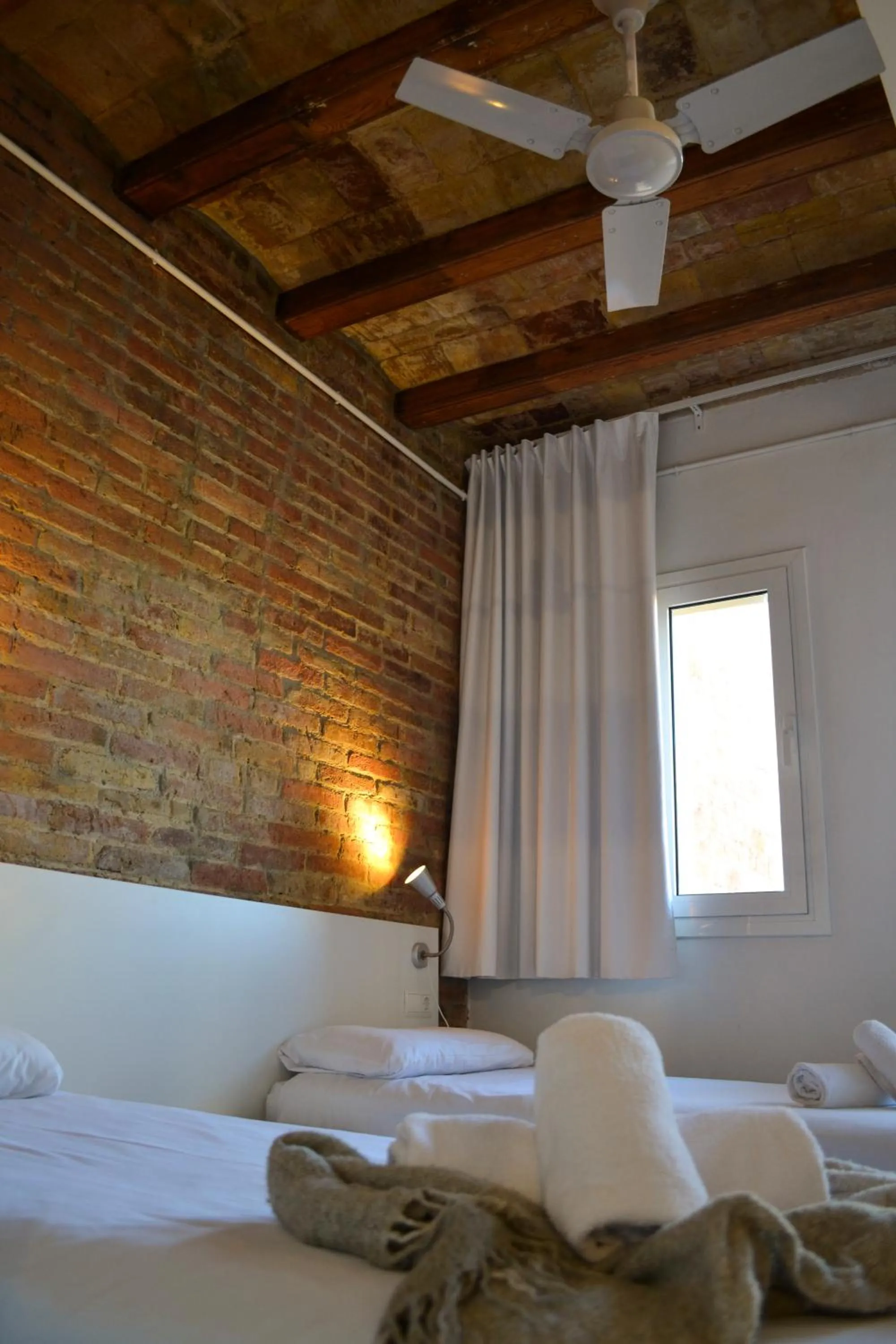 Bed in Happy People Plaza España Apartments