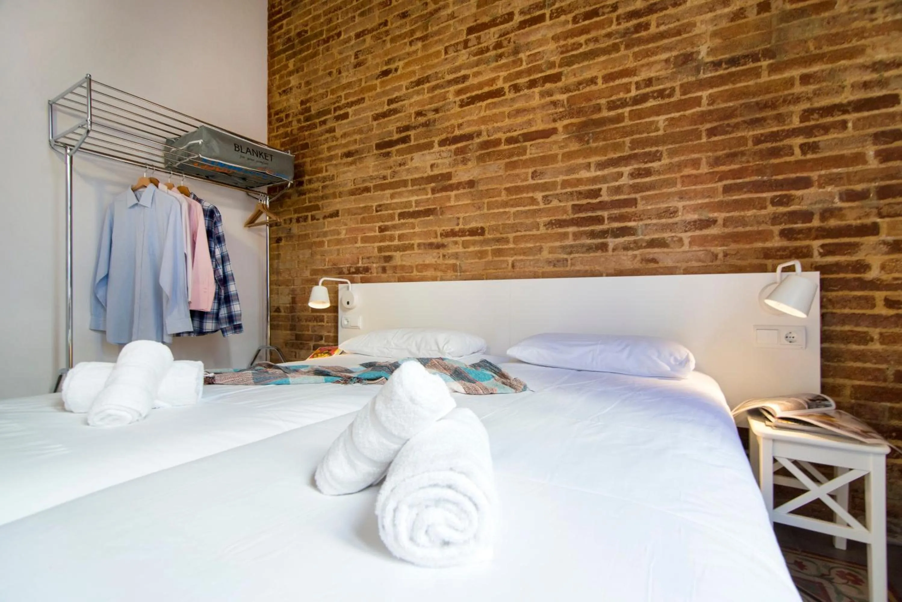 Bed in Happy People Plaza España Apartments