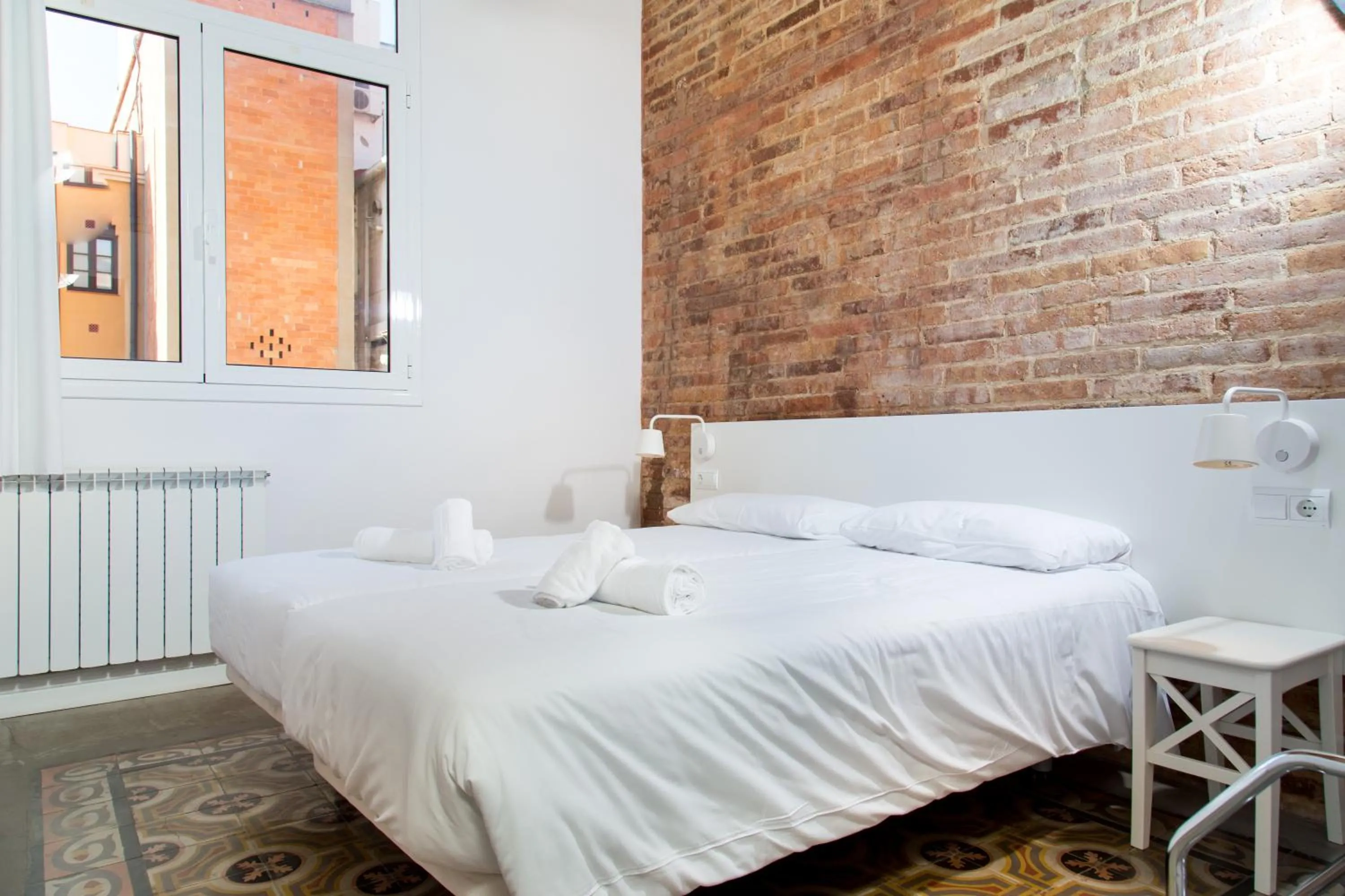 Bed in Happy People Plaza España Apartments