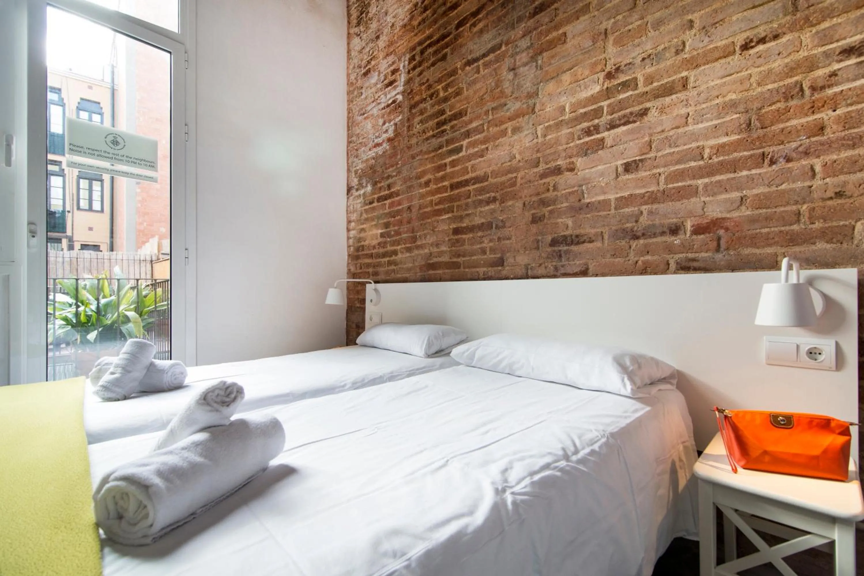 Bed in Happy People Plaza España Apartments