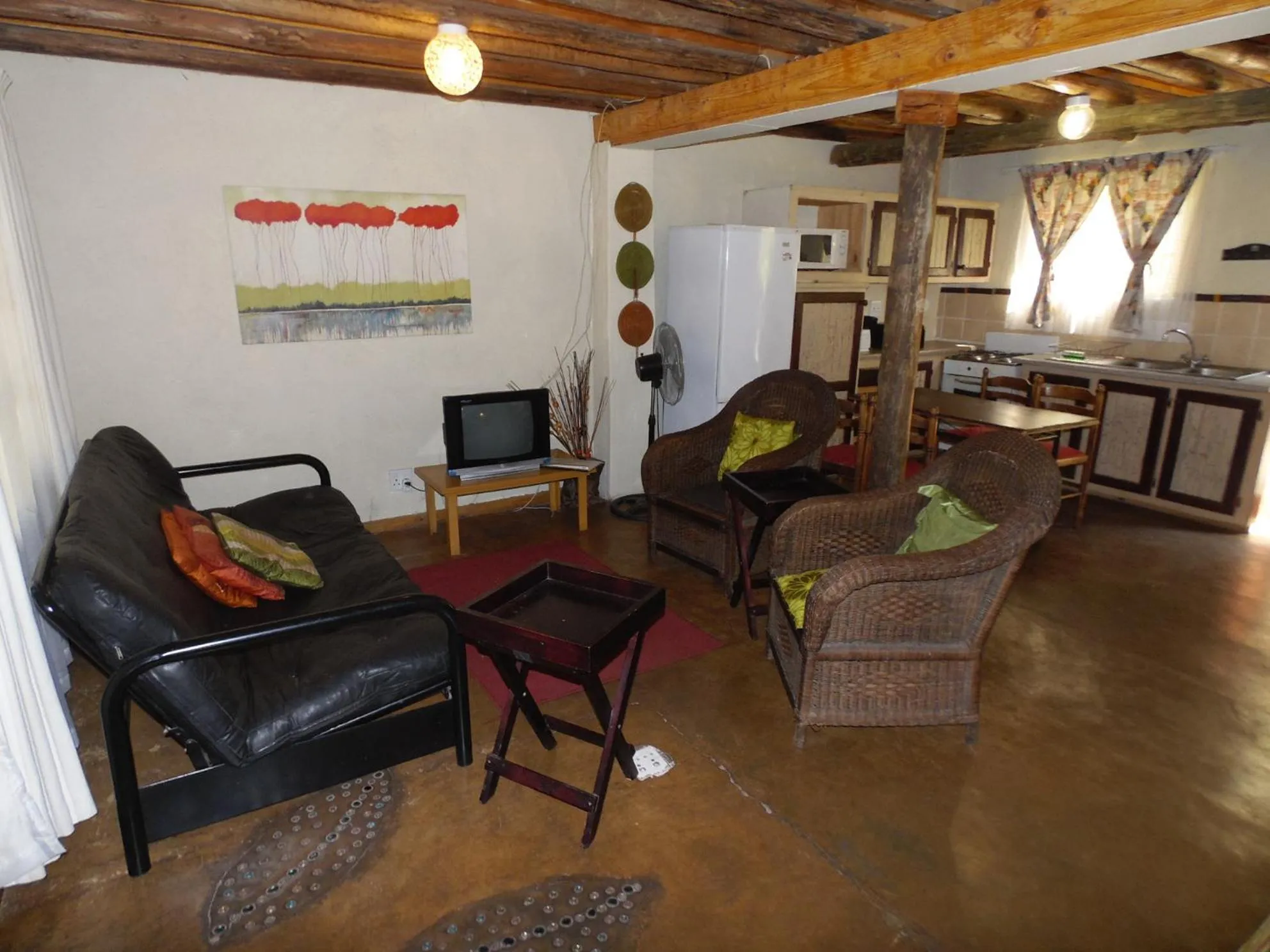 Seating area in Hazyview Country Cottages