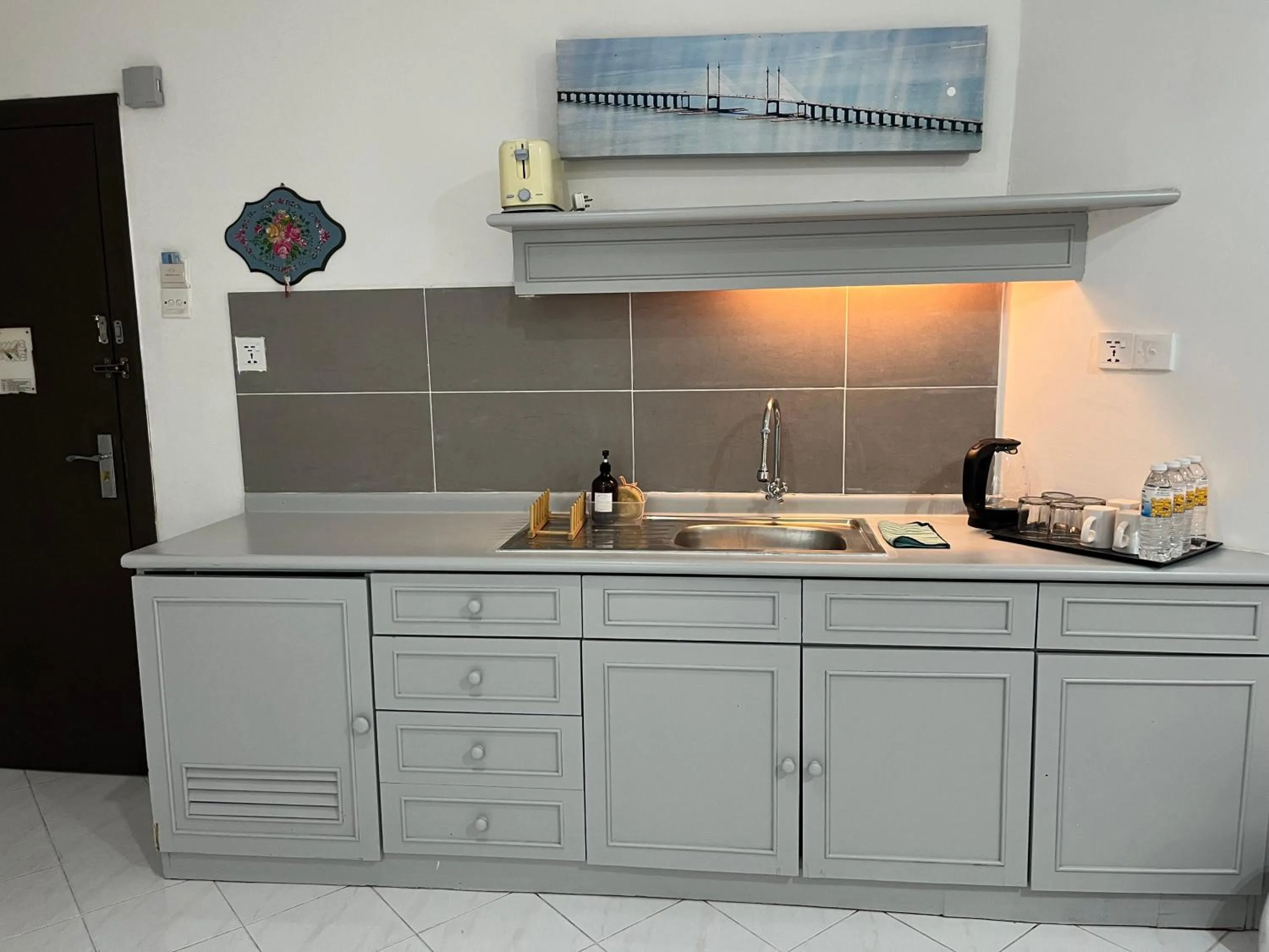 Kitchen or kitchenette in Paradise by the Sea in Penang by Veron at Rainbow Paradise