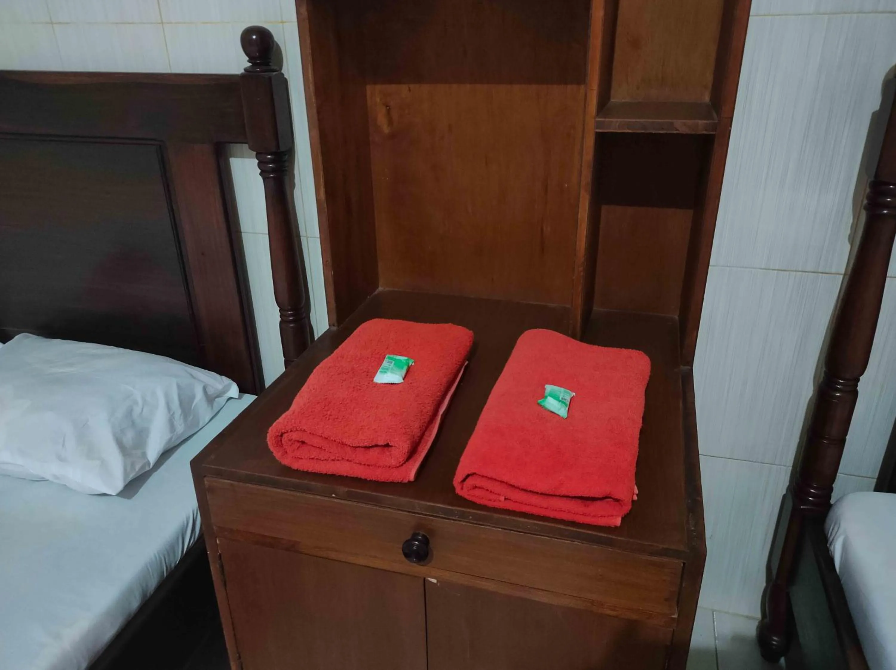 Bed in Penginapan Mentorogo Kaliurang Mitra RedDoorz