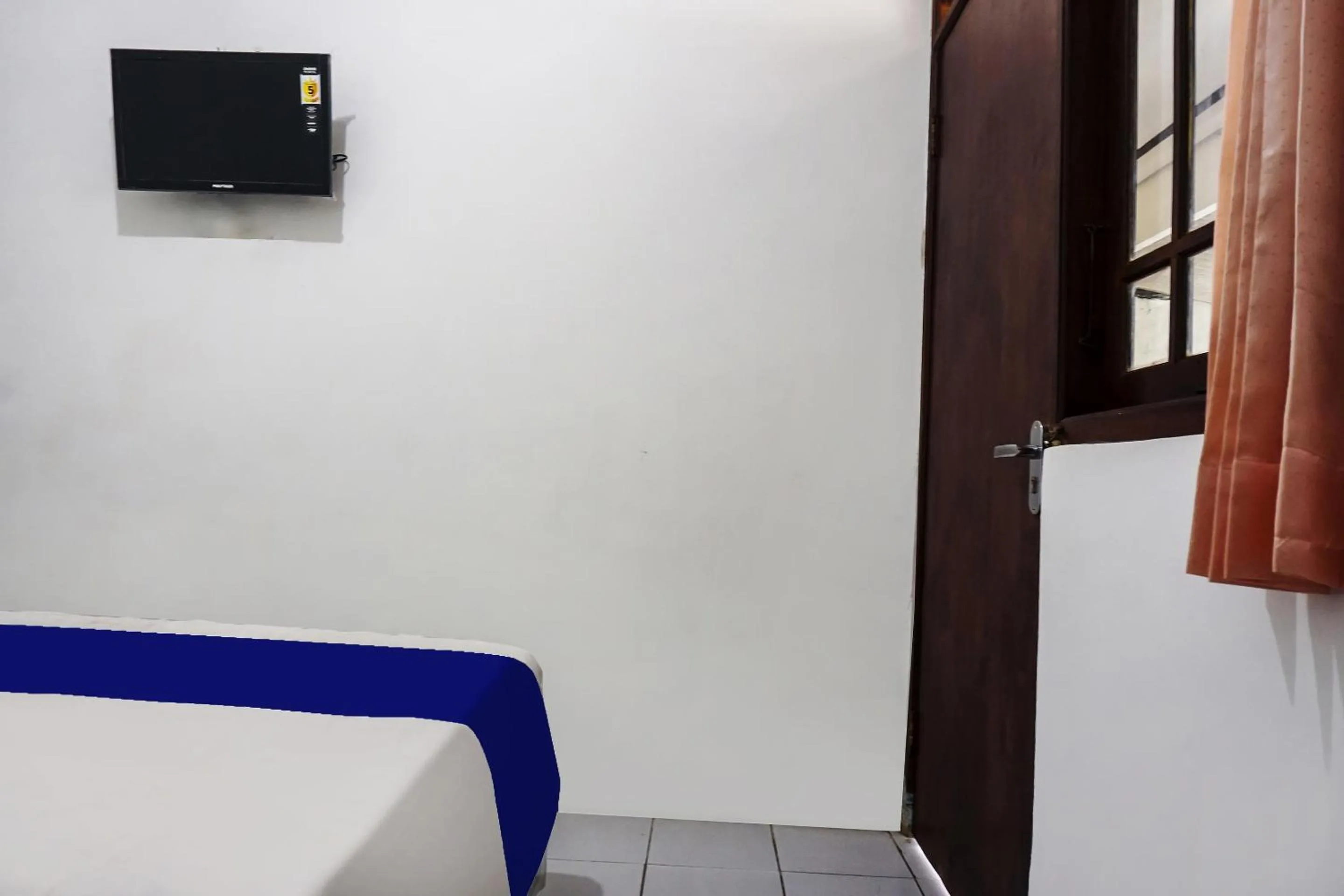 Bedroom in Hotel O Wisma Asri Putra Syariah