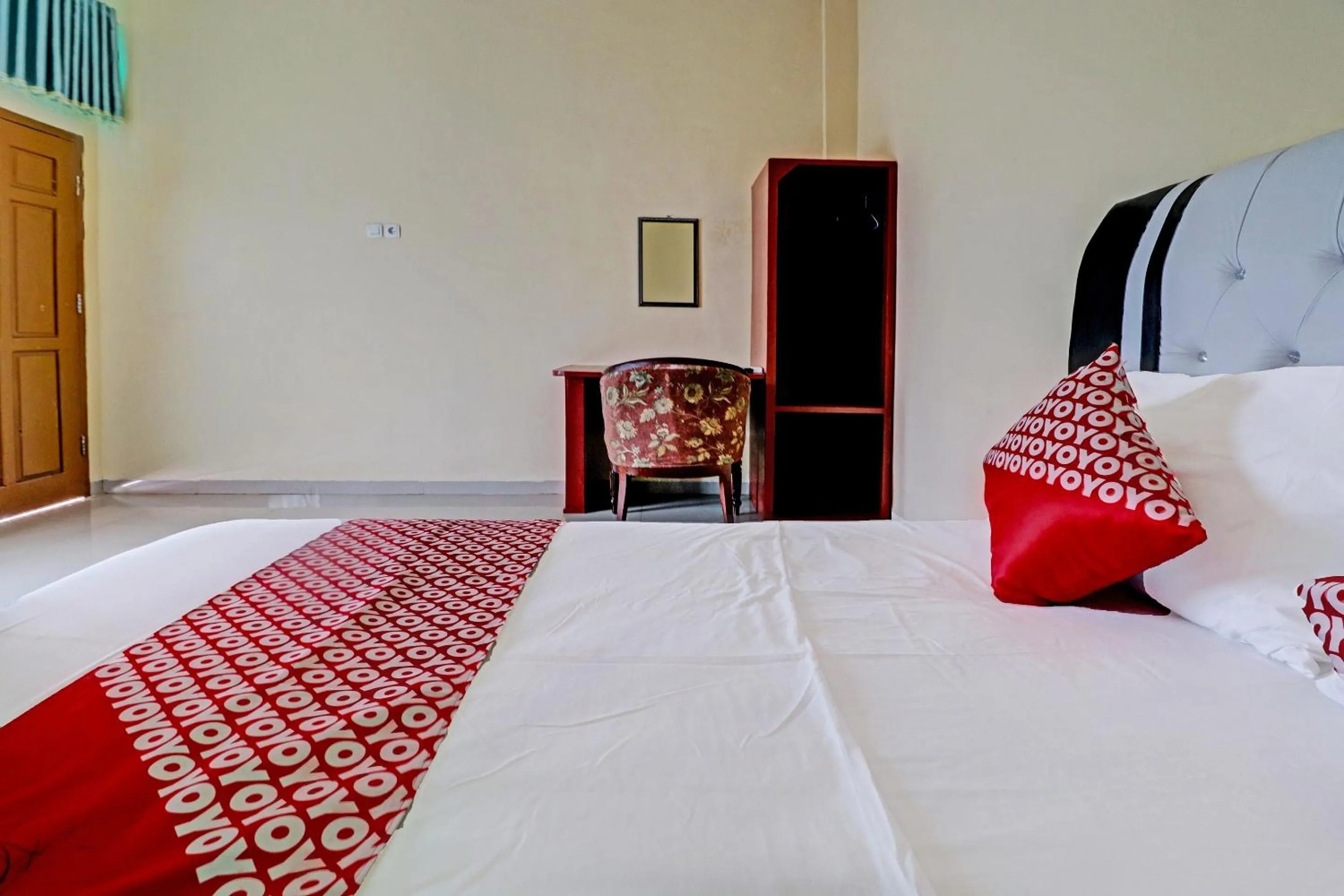 Bedroom in OYO 90945 Arizon Kost