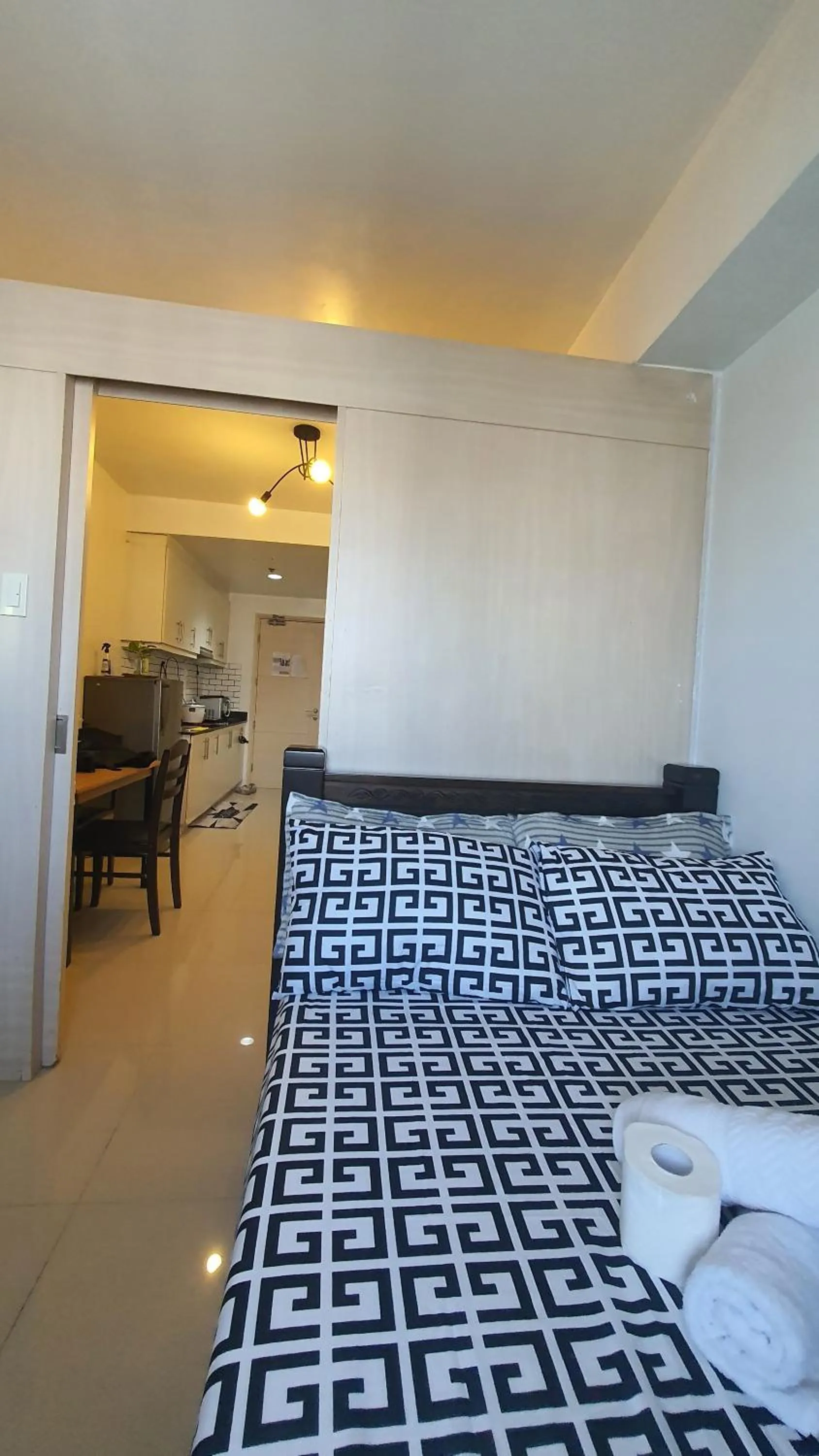 Bed in Sea Residences by EZ Stays