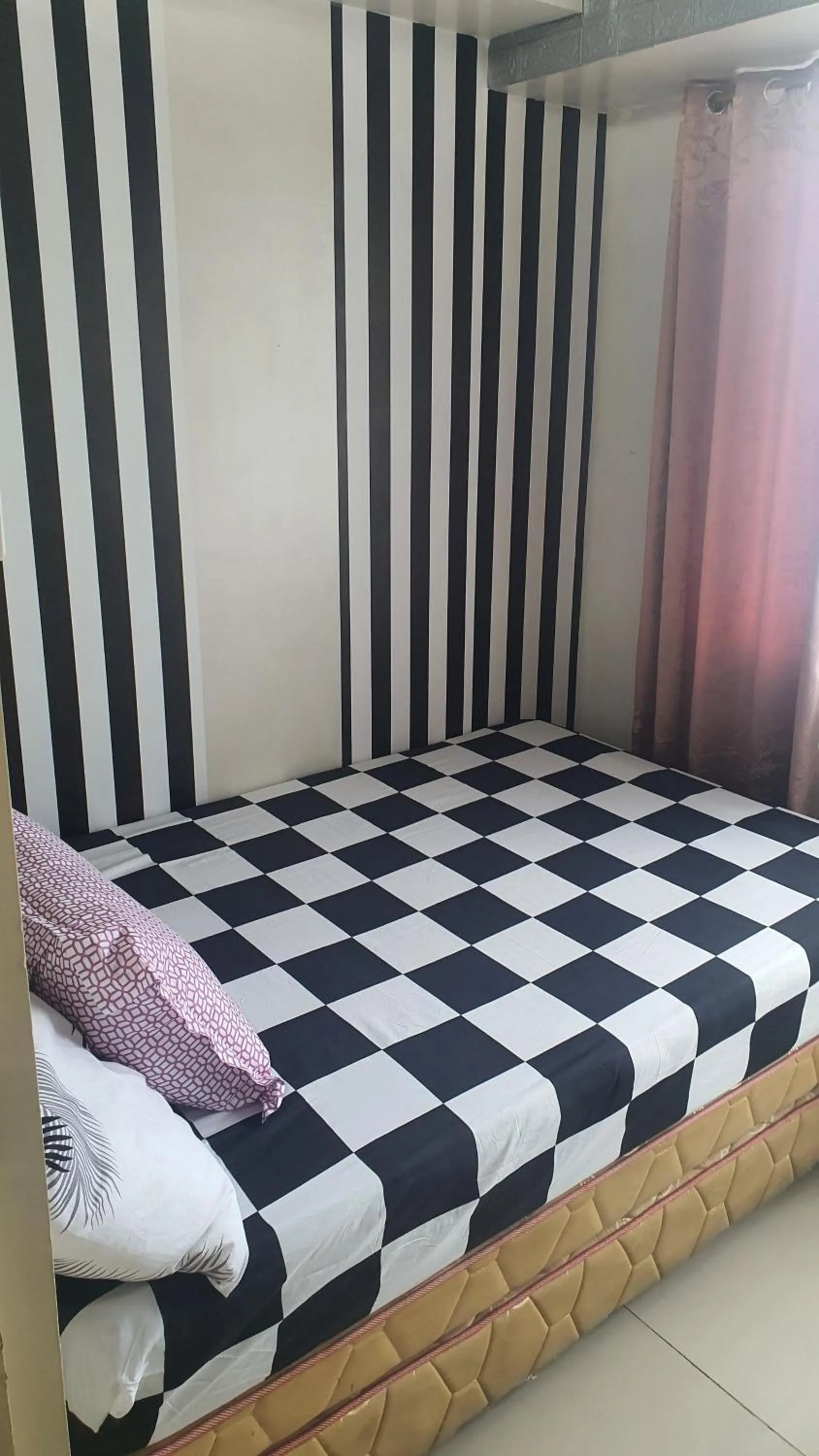 Bed in Sea Residences by EZ Stays