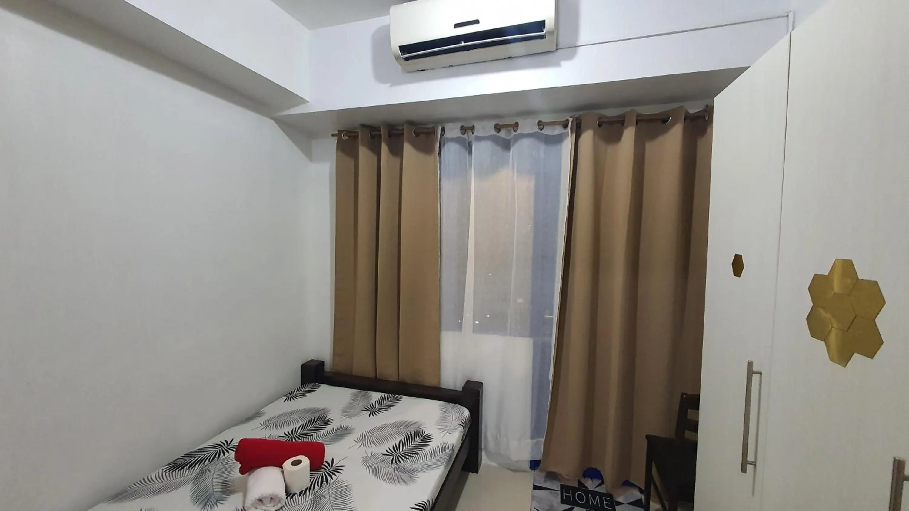 Bed in Sea Residences by EZ Stays