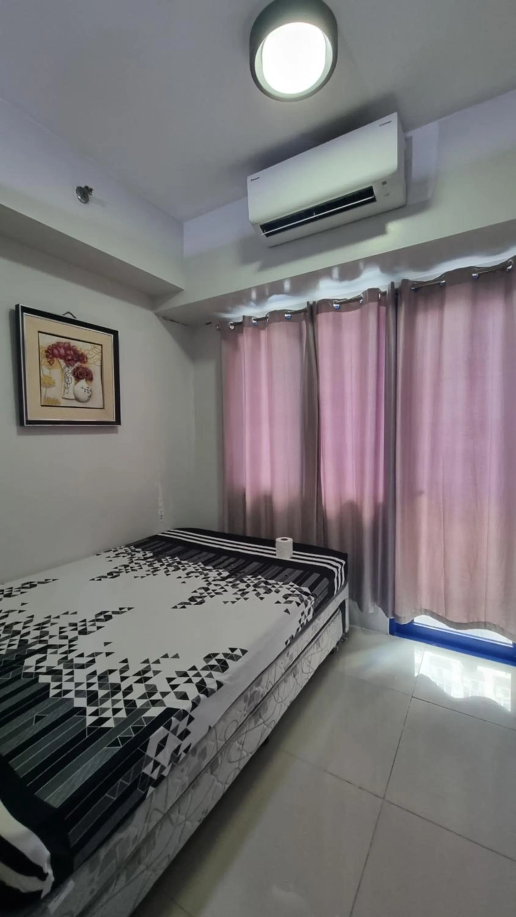 Bed in Sea Residences by EZ Stays