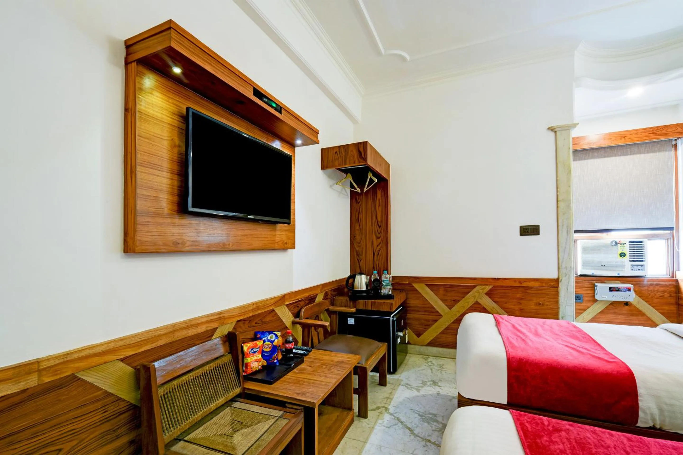 Communal lounge/ TV room, Bed in Hotel Cottage Yes Please New Delhi