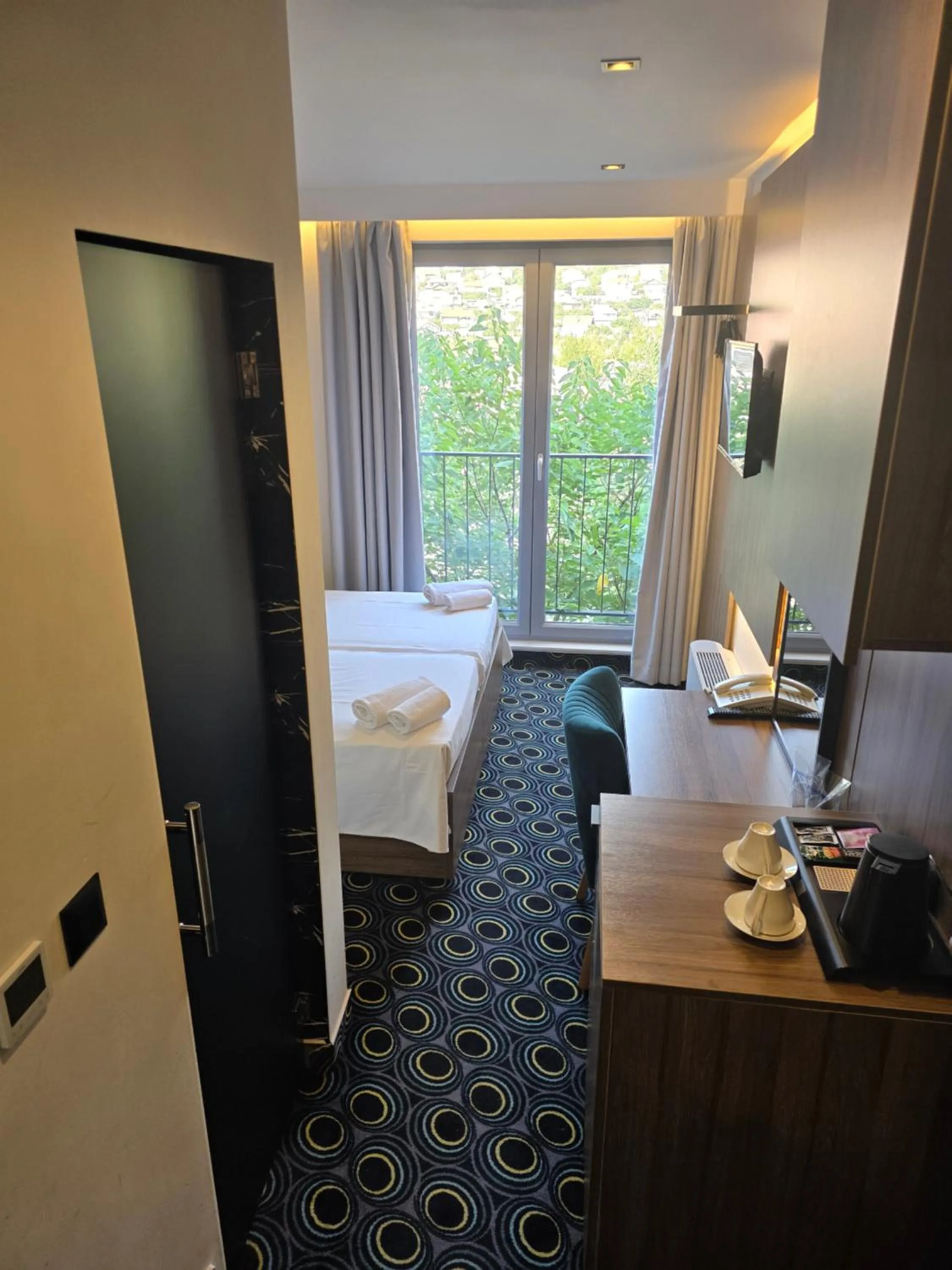 Bed in Hotel Carpe Diem