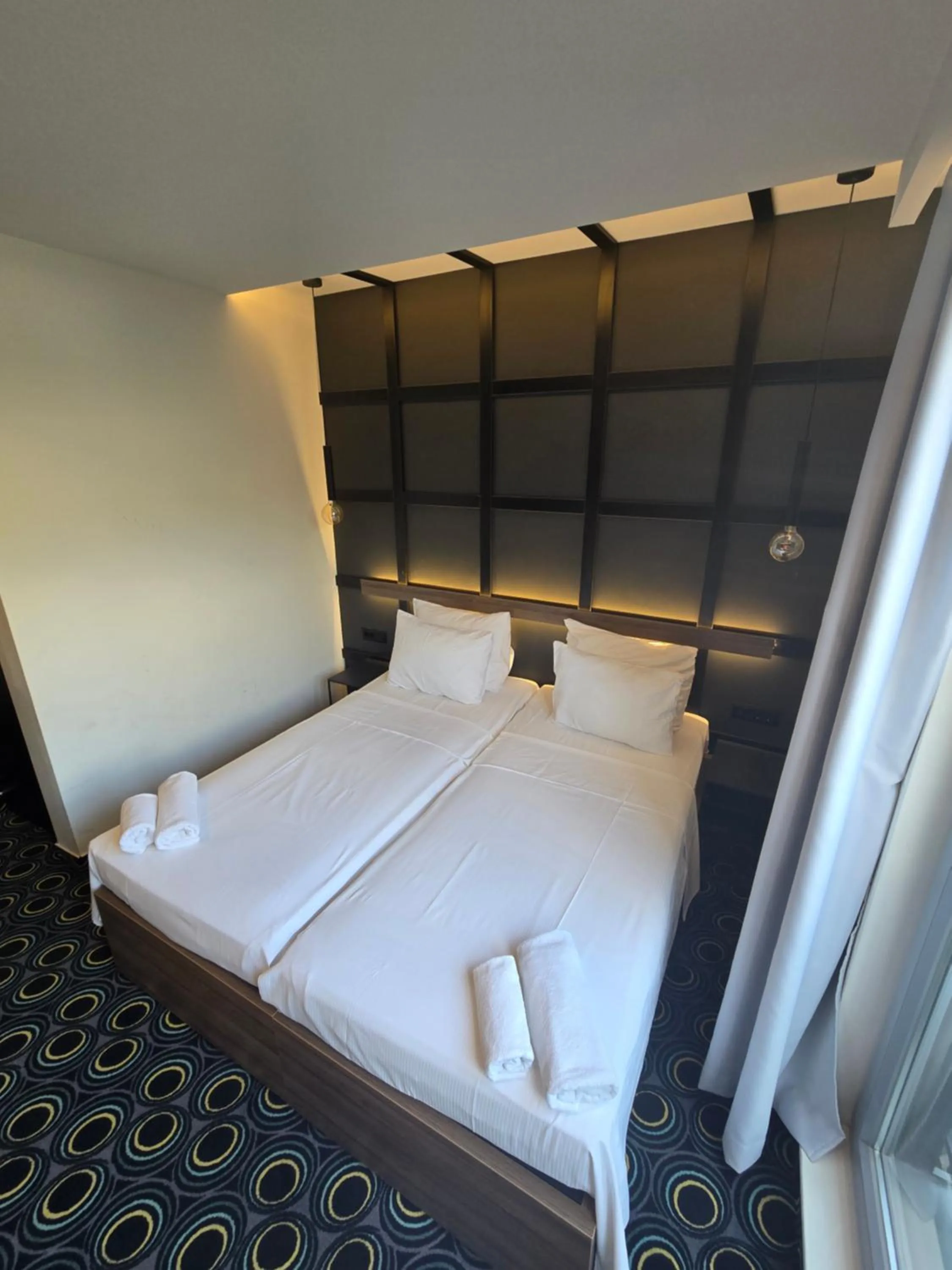 Bed in Hotel Carpe Diem