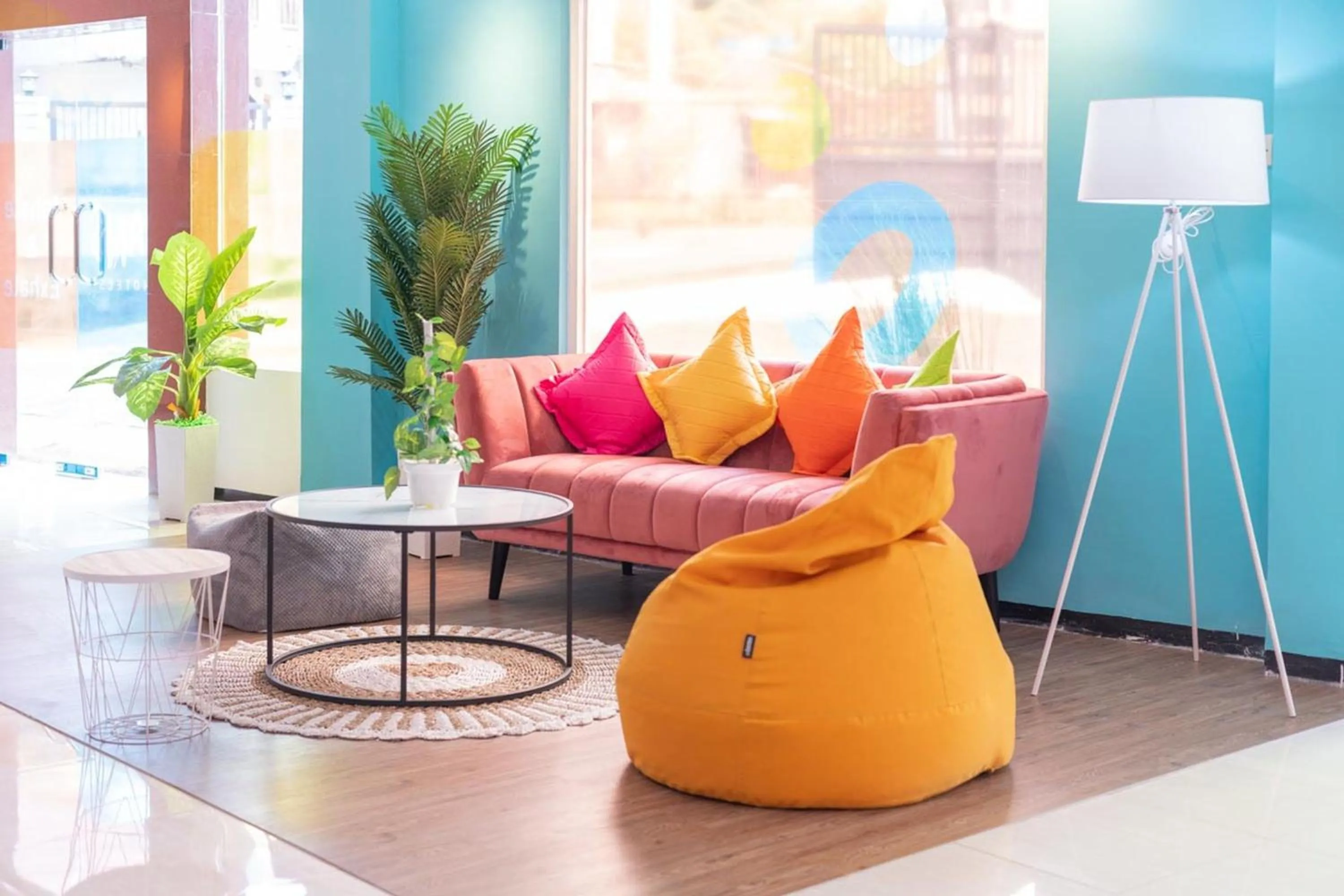 Seating area in Sans Hotel Queen Batu