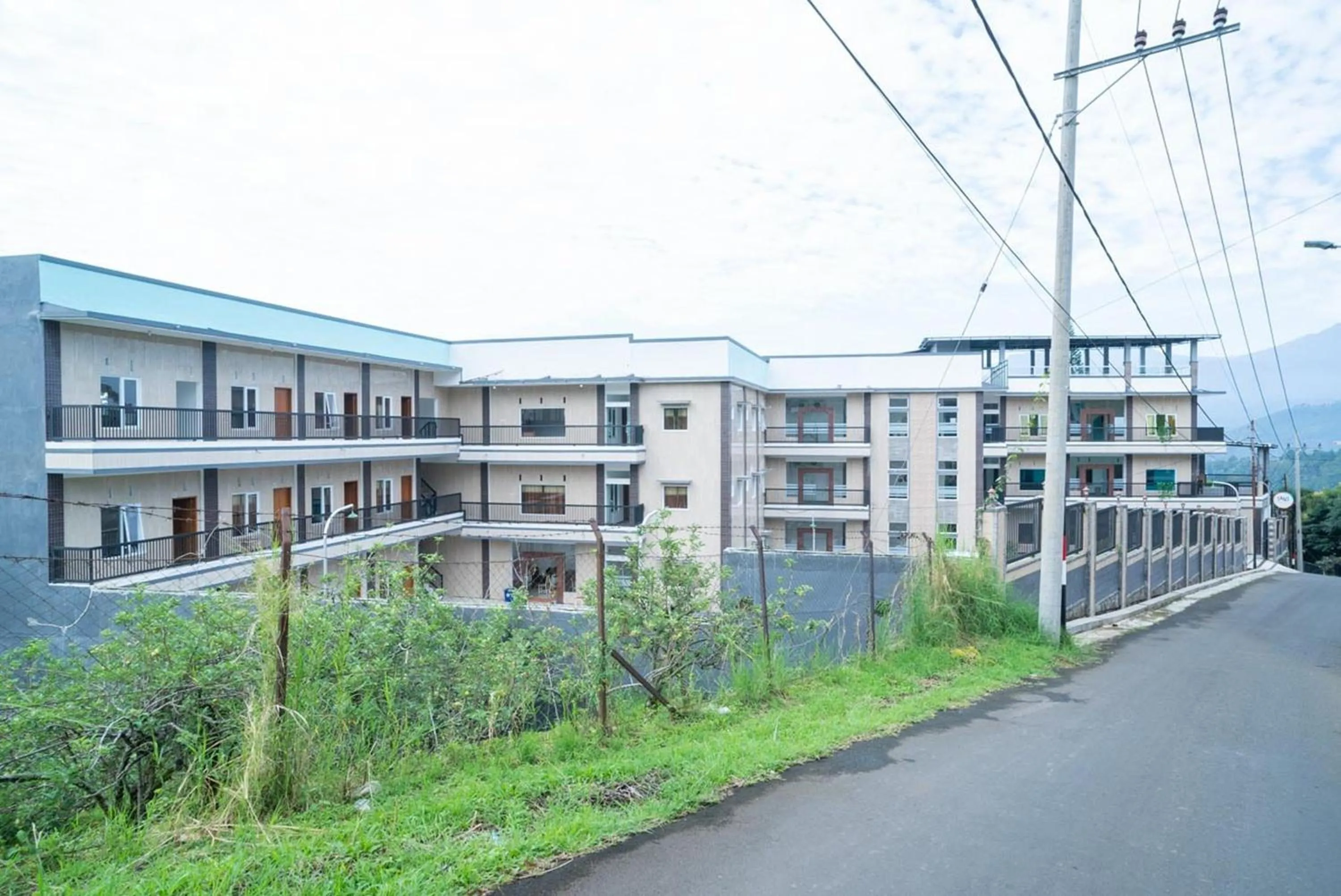 Property building in Sans Hotel Queen Batu