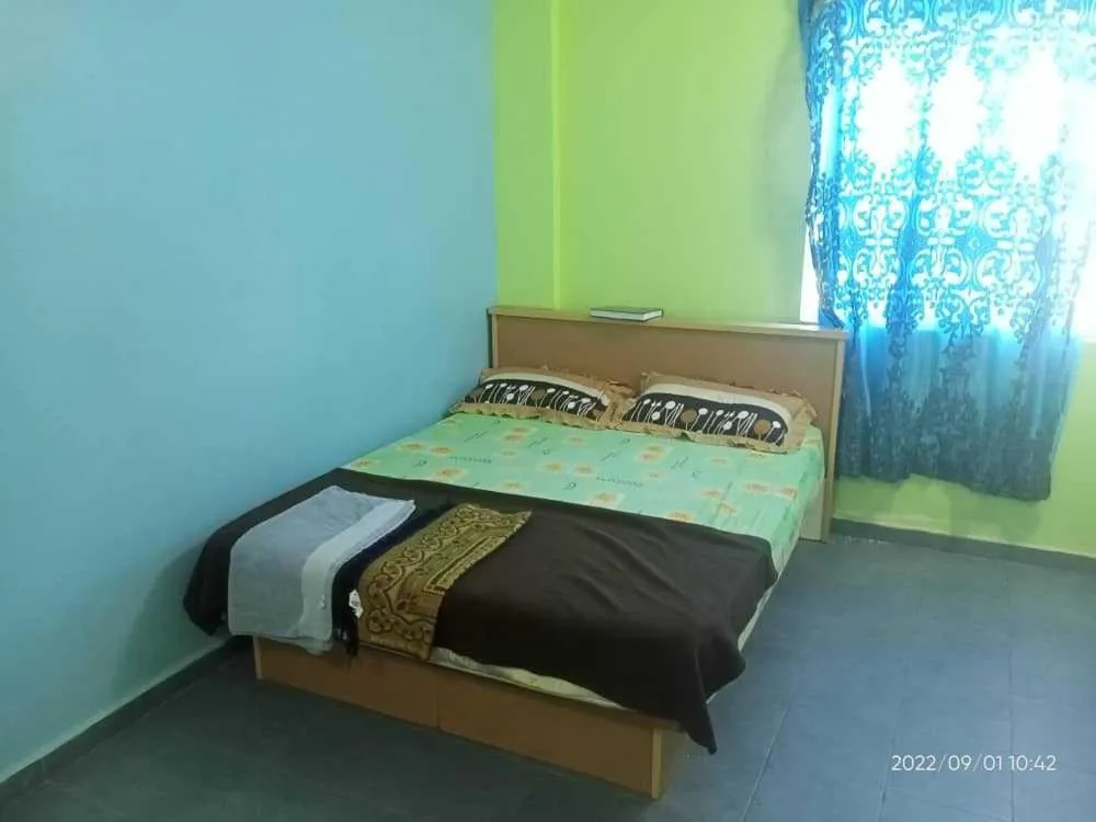 Bedroom in OYO 90471 Hotel Tepoh