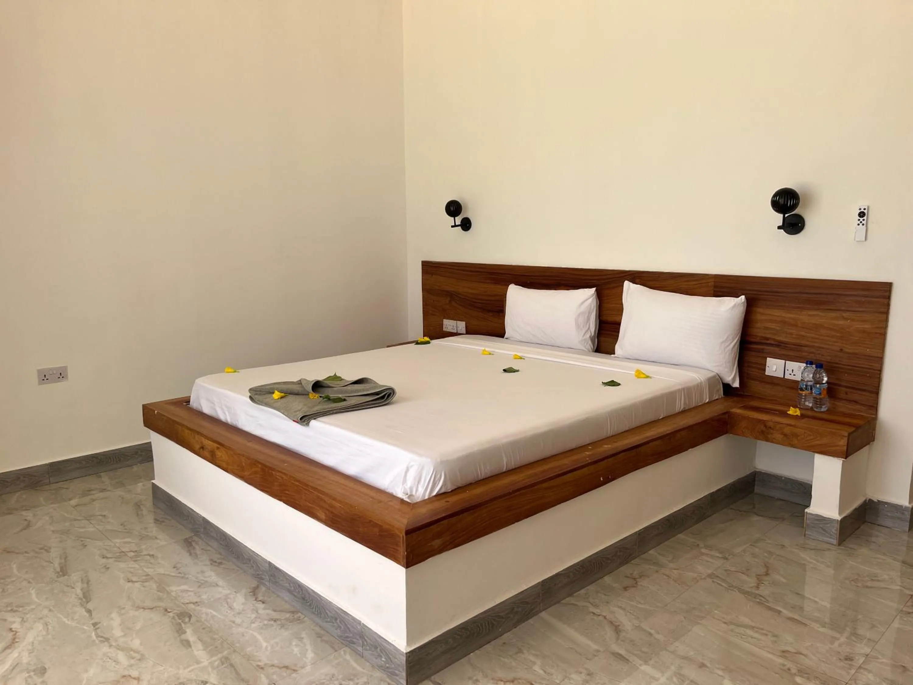 Bed in Jambo Beach Hotel Paje