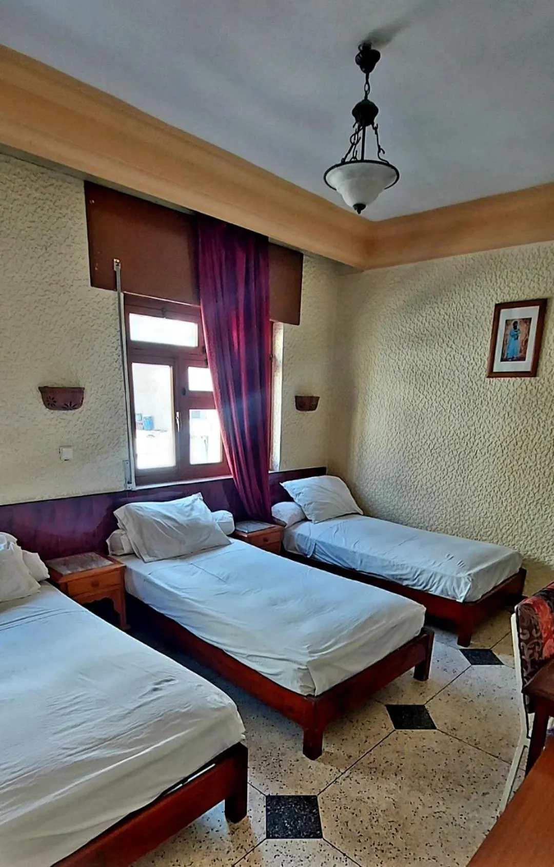 Bed in Hôtel National