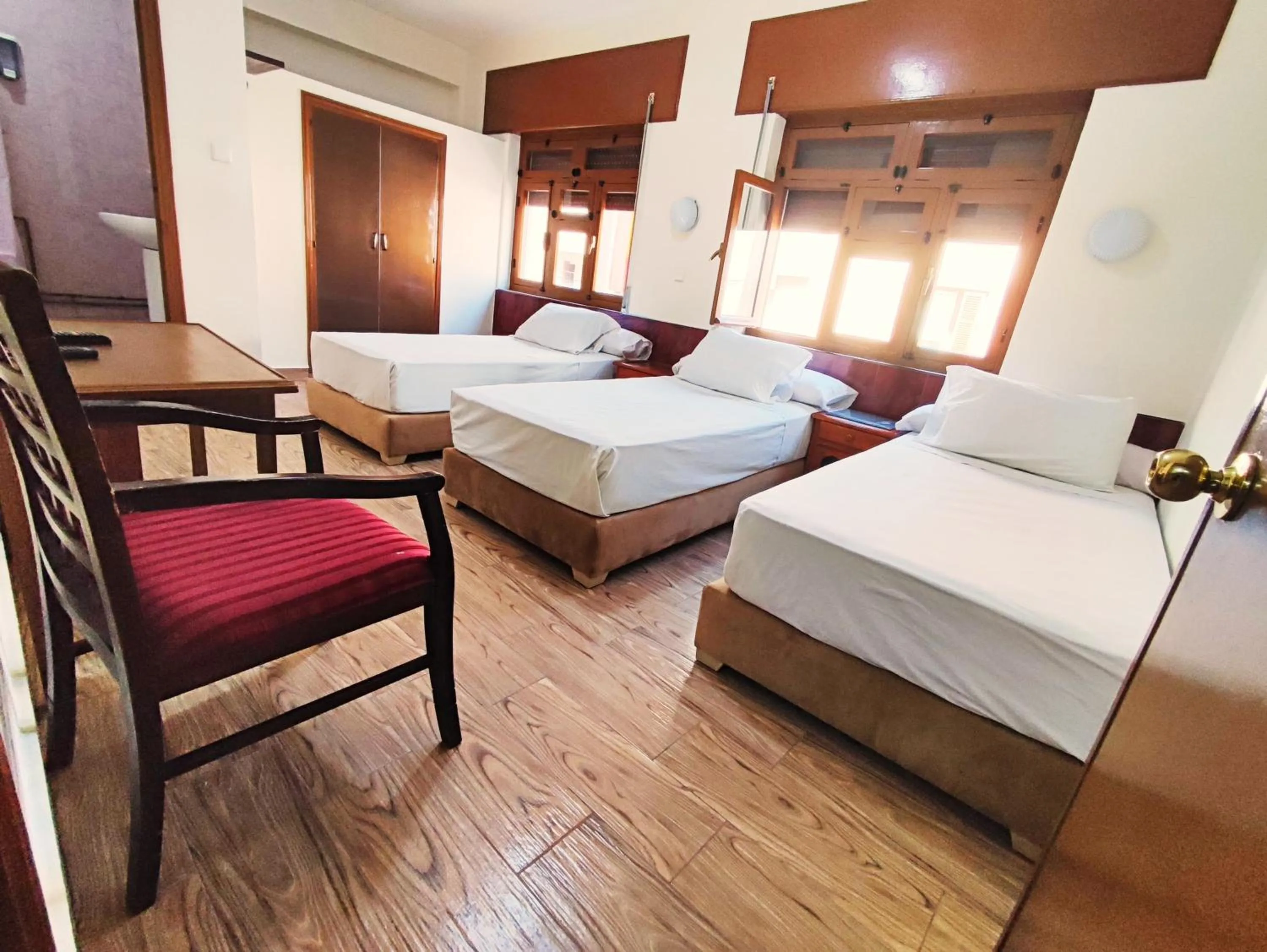 Bed in Hôtel National