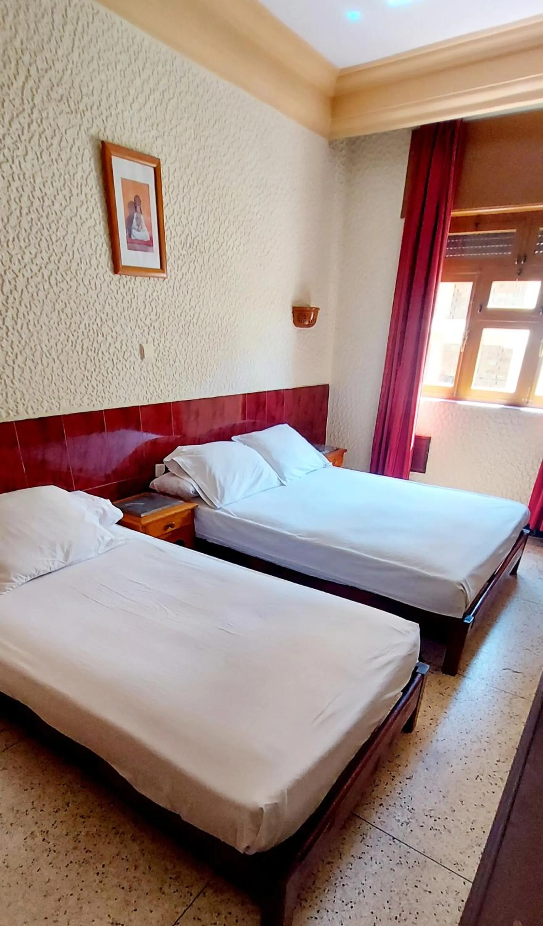 Bed in Hôtel National