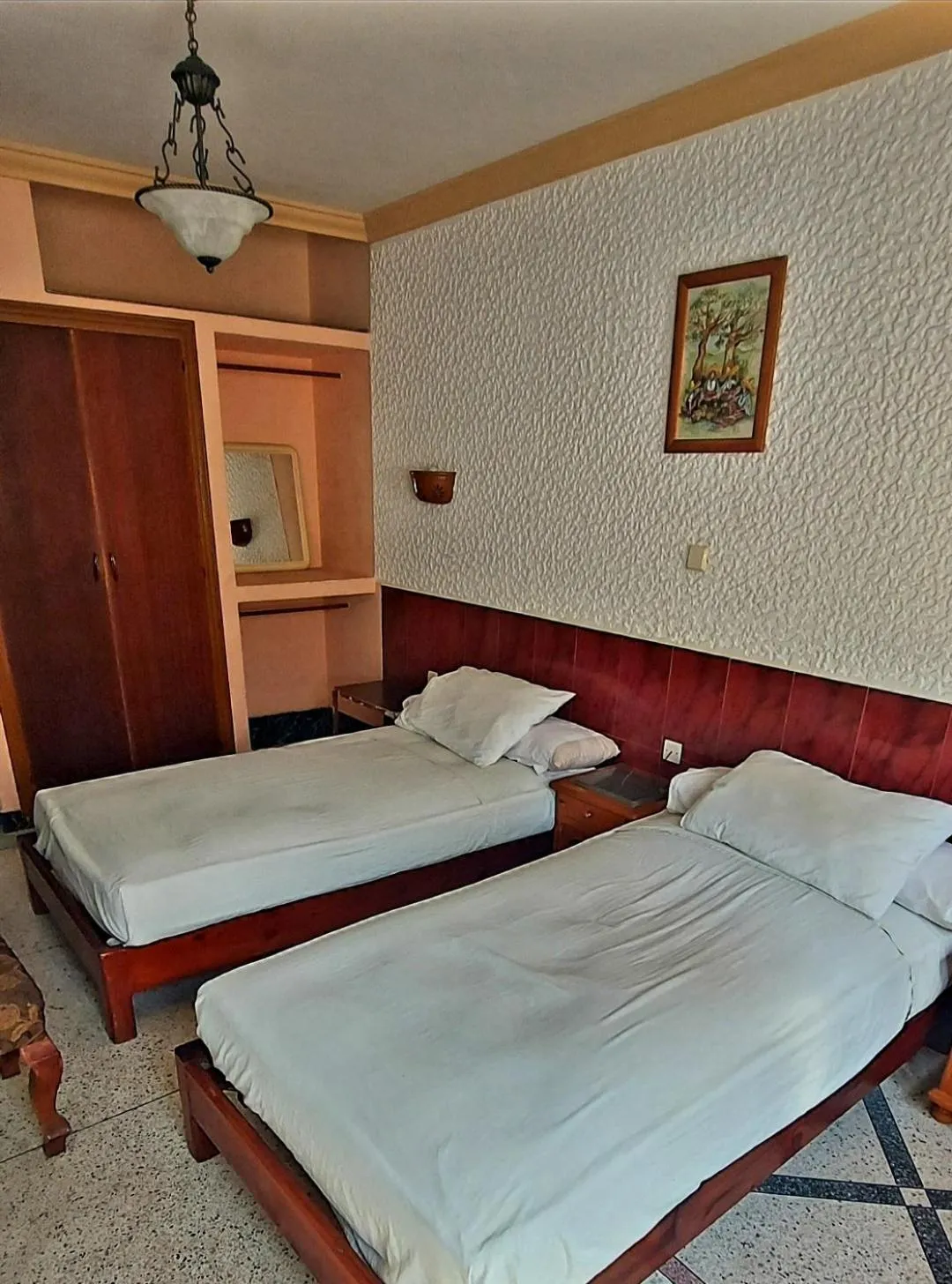 Bed in Hôtel National