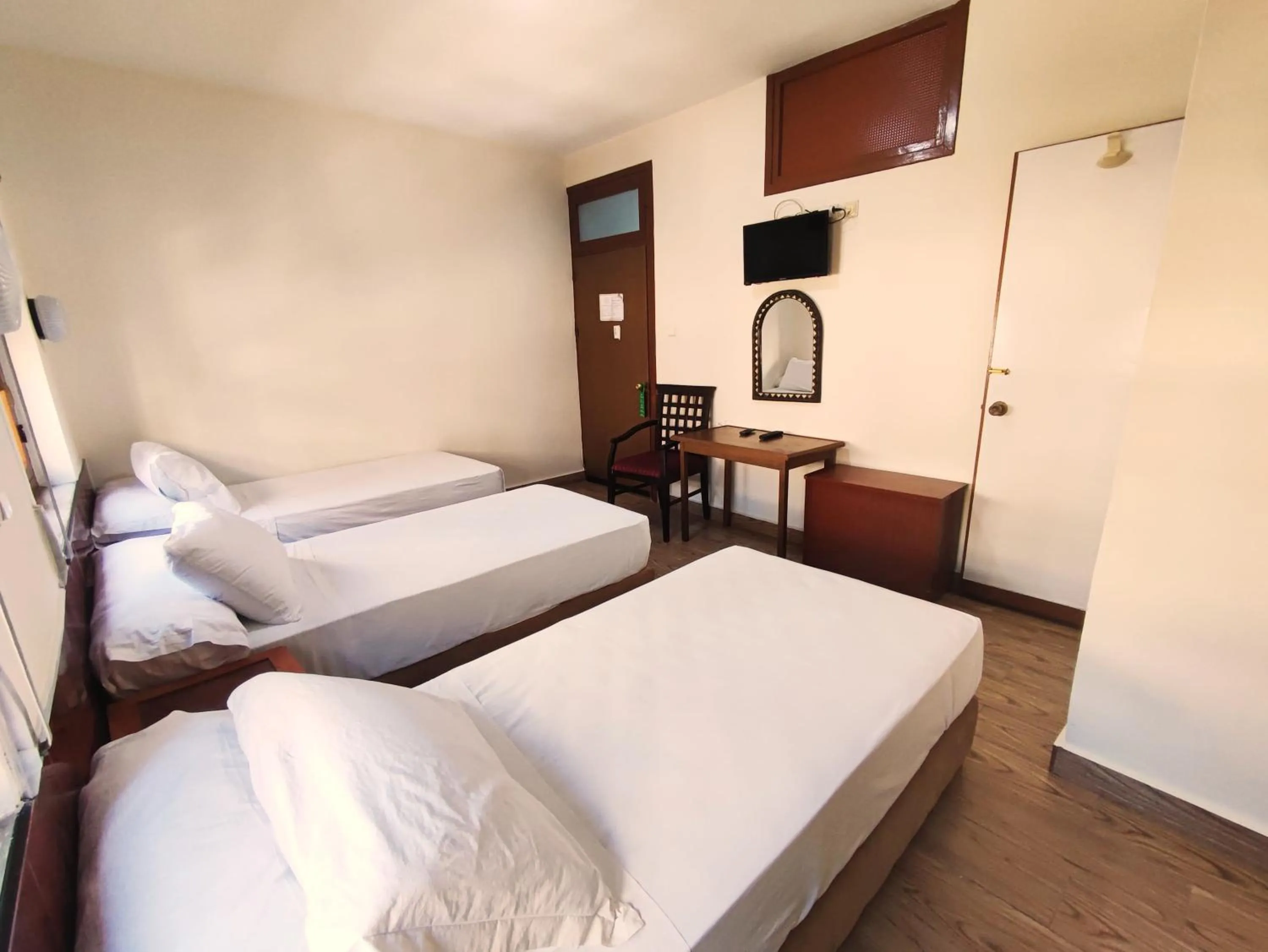 Bed in Hôtel National