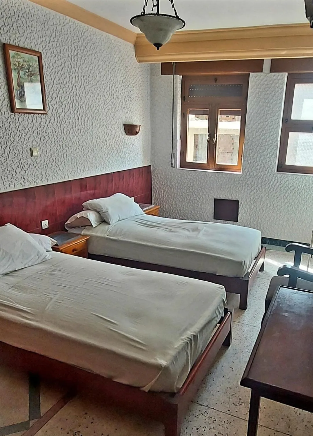 Bed in Hôtel National