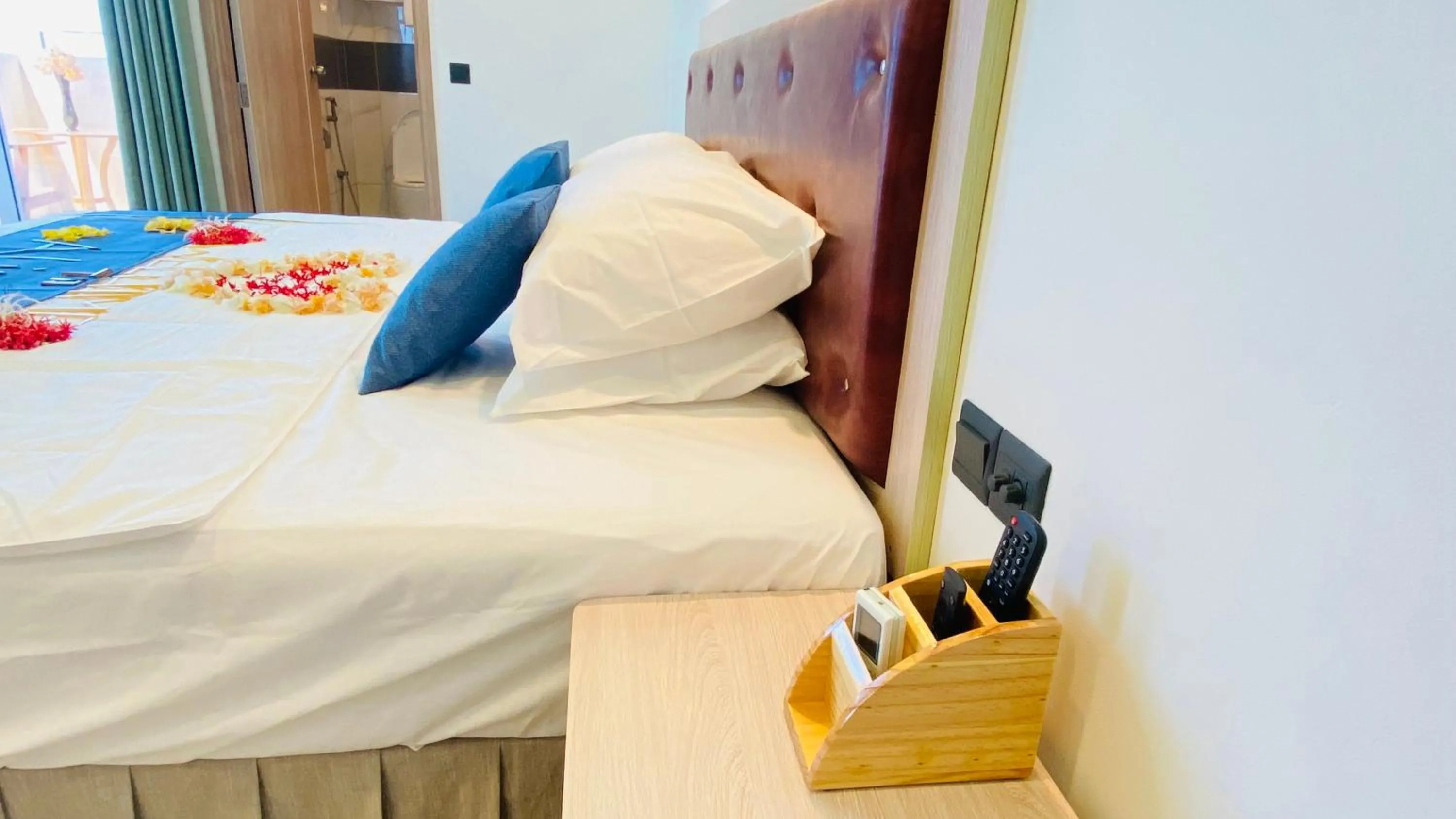 Bed in Alimas Holiday Retreat Maldives