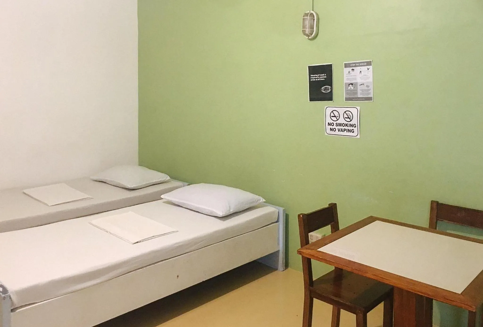 Bedroom, Bed in Mainstreet Pension House by RedDoorz